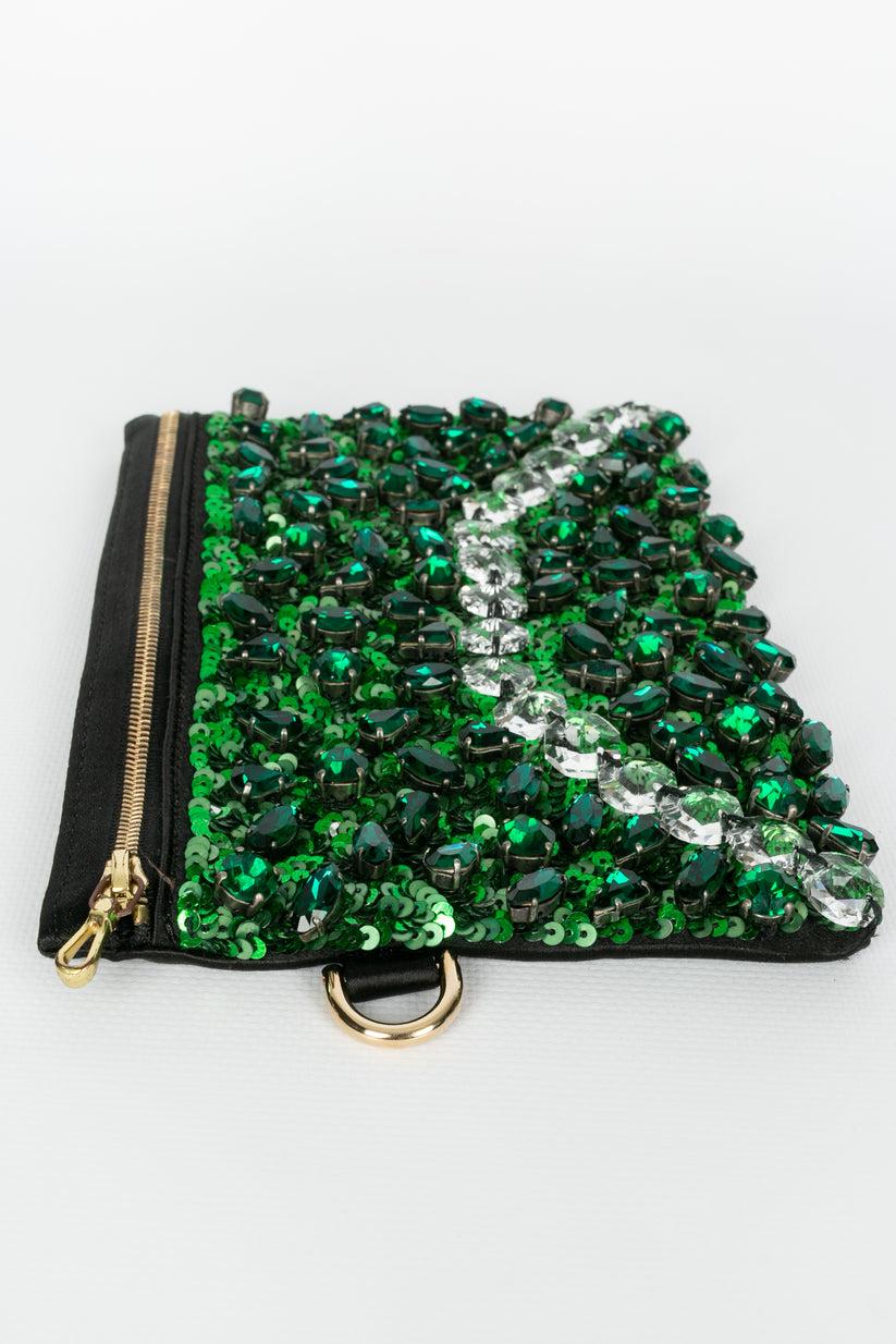 Lanvin - (Made in Italy) Clutch fully embroidered with sequins and rhinestones in green tones.

Additional information: 
Dimensions: Height: 14 cm, Width: 20 cm
Condition: Very good condition
Seller Ref number: S246