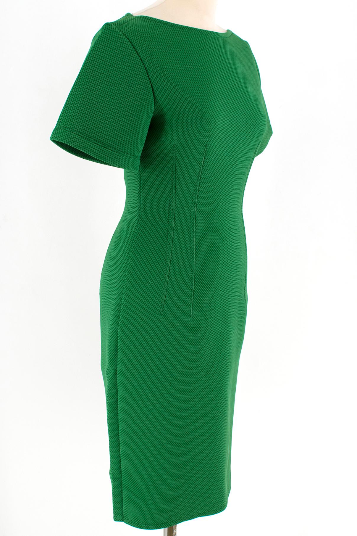 Lanvin Green Fitted Mesh Dress

Short sleeved mid-length green dress with stitch detailing 
Stretch material
Dart Stitch Detailing on dress front and back 
Single back closure top to bottom of the dress
Back dress slit 

Please note, these items are