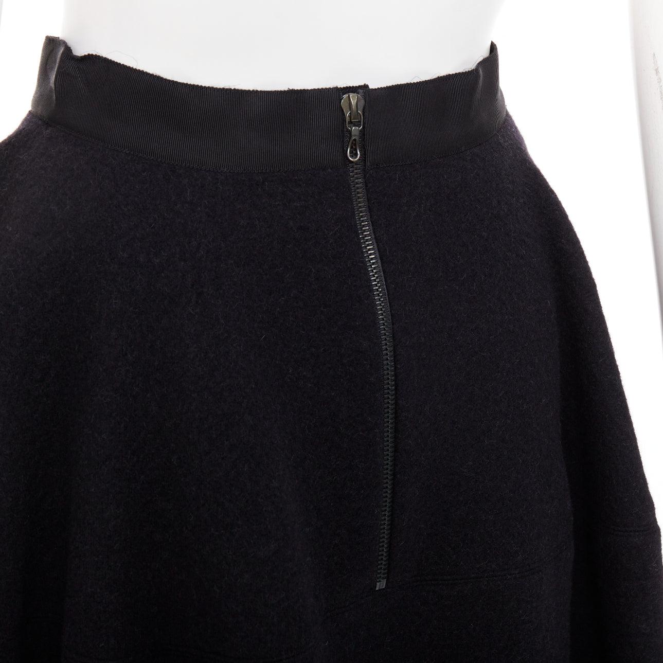 LANVIN falda acampanada gris mezcla de lana con cinturilla negra FR34 XS
Referencia: SNKO/A00572
Marca: Lanvin
Diseñador: Alber Elbaz
Material: Lana, mezcla
Color: Gris, Negro
Patrón: Sólido
Cierre: cremallera
Detalles adicionales: Silueta