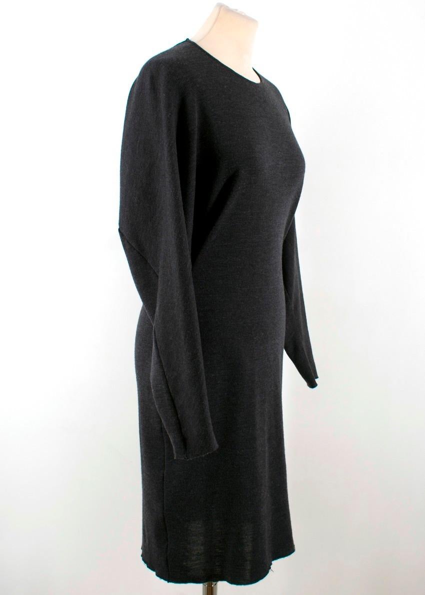 Lanvin Grey Long Sleeve Dress

-Long sleeve grey wool dress
-Raw hem
-Hook and eye ruching detailing at the waist
-Batwing sleeves

Approx.
Measurements are taken laying flat, seam to seam. 

Length - 96cm
Bust - 47cm
Sleeve length -63cm