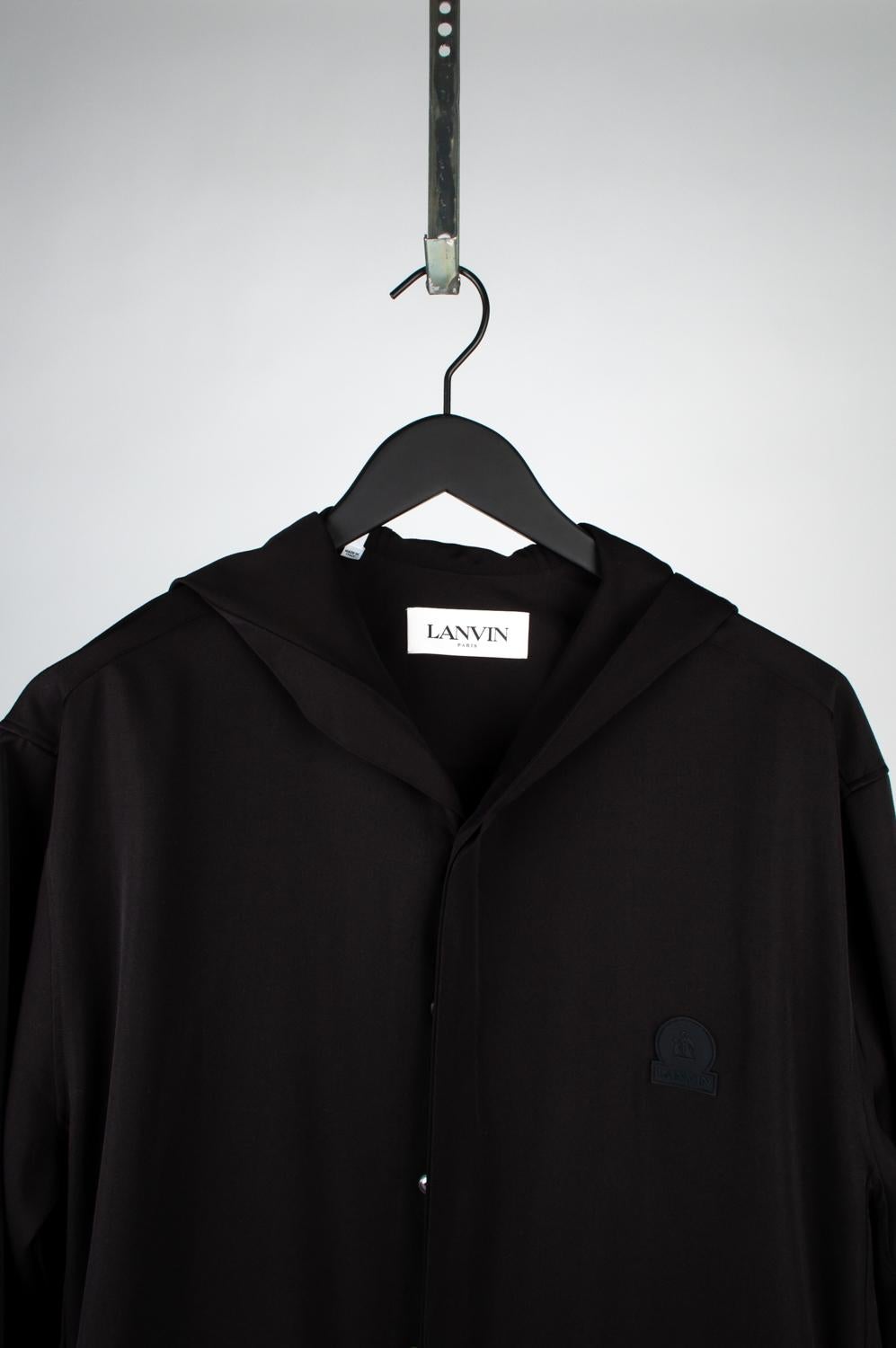 100% genuine Lanvin Hooded Light Jacket, S551-1
Color: Black
(An actual color may a bit vary due to individual computer screen interpretation)
Material: 100% wool
Tag size: 41/16 runs Large
This jacket is great quality item. Rate 9 of 10, excellent