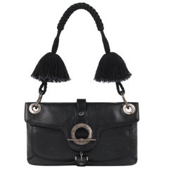 LANVIN "Jeanne", borsa in pelle nera con cinturino con nappe e pom pom, con patta e tracolla