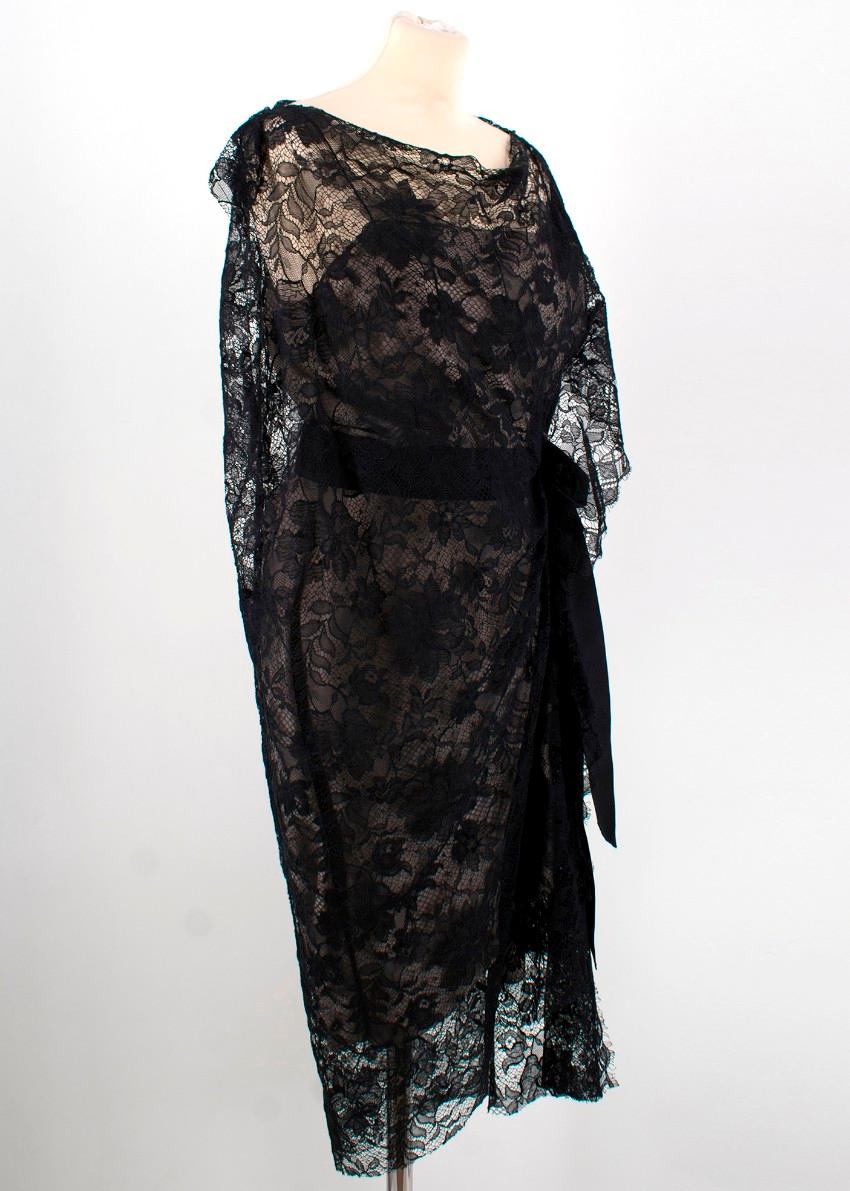 Lanvin Lace Dress

- Lace overlay
- Slit neckline
- Ruffle sleeves
- Ruching to the side
- Waistband on the interior
- Self-tie at the side
- Asymmetric hem
- Khaki slip on the interior
- 70% Cotton, 30% Polyamide

Please note, these items are