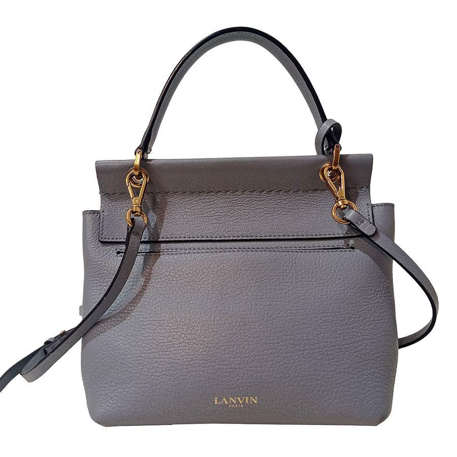 Year 2015 Leather Grey/light blue color Single handle Can be carried crossbody too Golden metal External pocket Internal pocket Cm 25 x 22 x 11 (9,8 x 8,66 x 4,33 inches)
