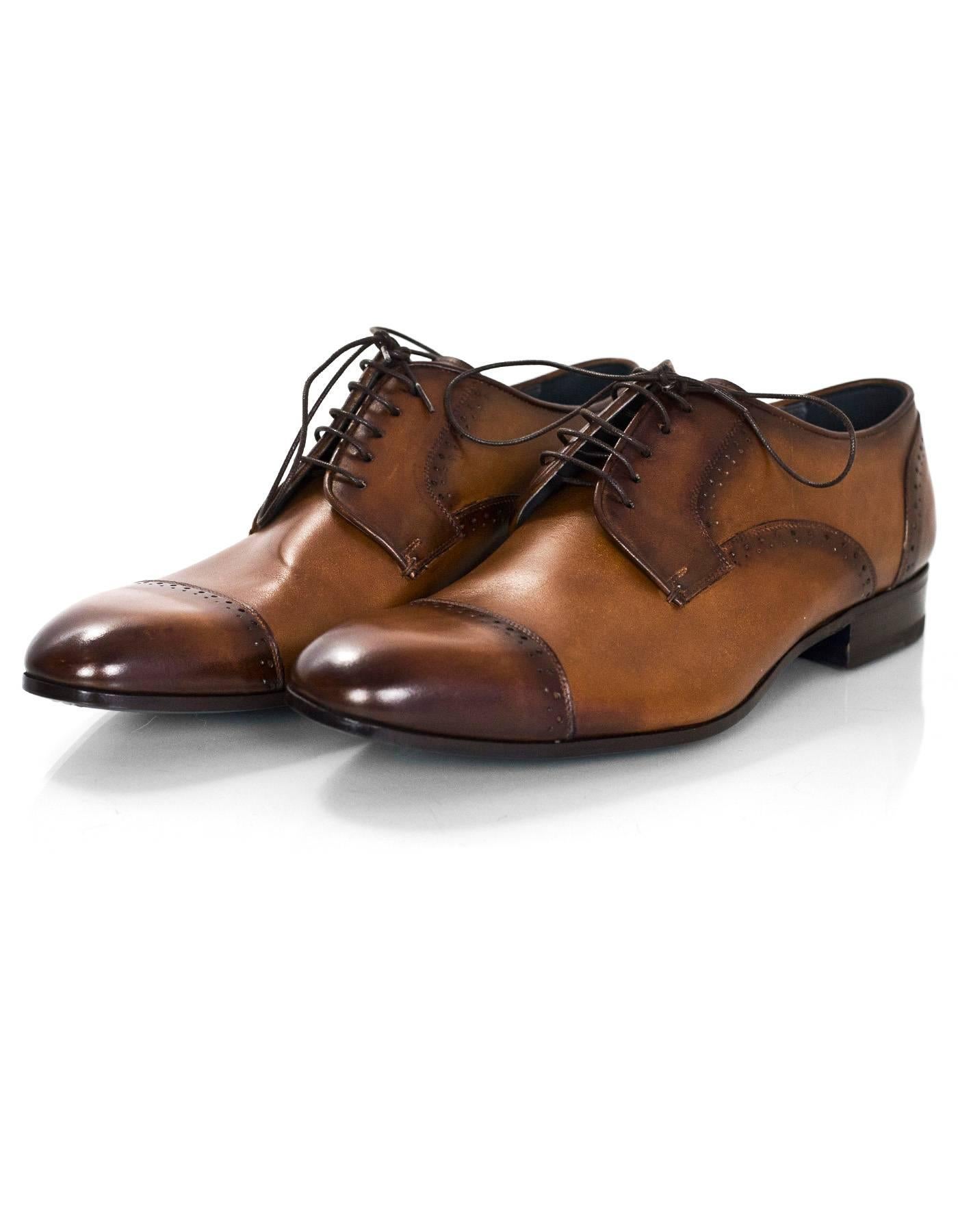 Lanvin Men's Brown Leather Oxford Shoes Sz 8 NIB

Made In: Italy
Color: Brown
Materials: Leather
Closure/Opening: Lace tie closure
Sole Stamp: Lanvin
Overall Condition: Excellent pre-owned condition
Included: Lanvin box, dust bags, extra