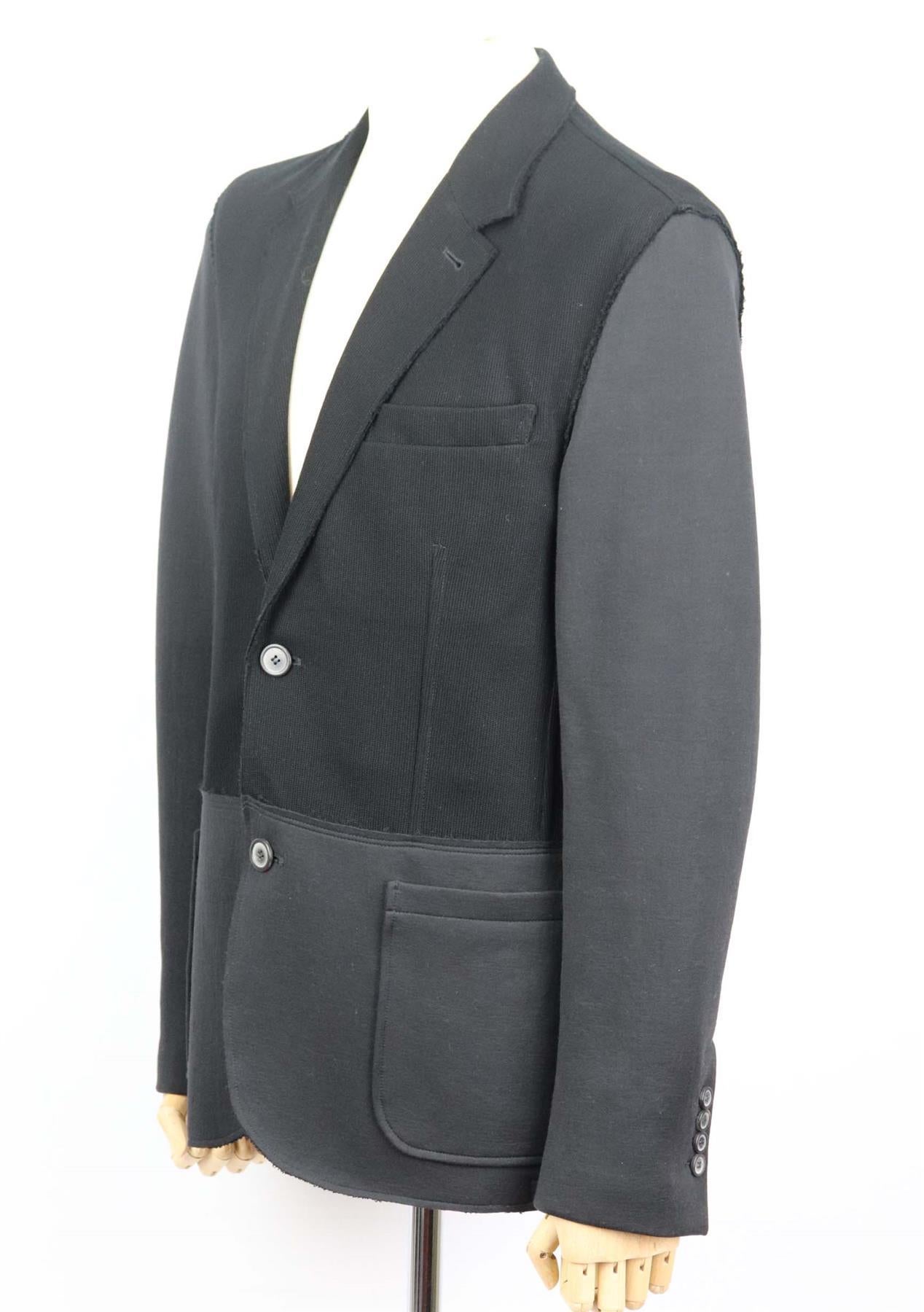 This men's jacket by Lanvin is the perfect example of how tailoring should look, it's cut in a slim fit cut with strong shoulders and knitted panelled detail on the chest. Black cotton. Button fastening at front. 100% Cotton; fabric2: 73% cotton,