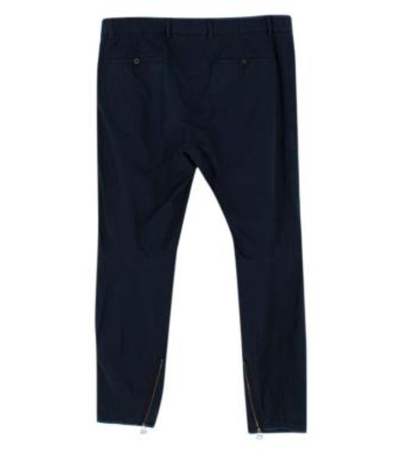 Lanvin Mens Trousers in size 50

- Classic fit with slip pockets on either side of trousers

- Zipper at the crotch in silver metallic

- Two back pockets with fixed buttons 

- Lighter coloured hemlines in blue on the ankles

- Two zip attachments