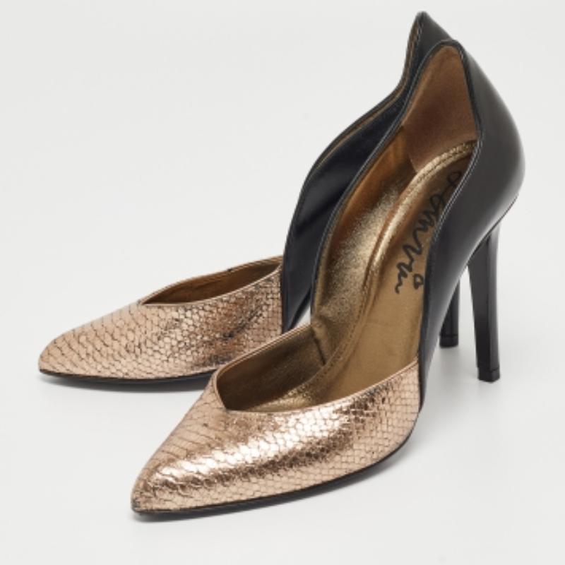 Zeigen Sie einen eleganten Stil mit diesem Paar Pumps. Diese eleganten Schuhe sind aus hochwertigen Materialien gefertigt. Sie sind auf robusten Sohlen und schlanken Absätzen aufgebaut.
