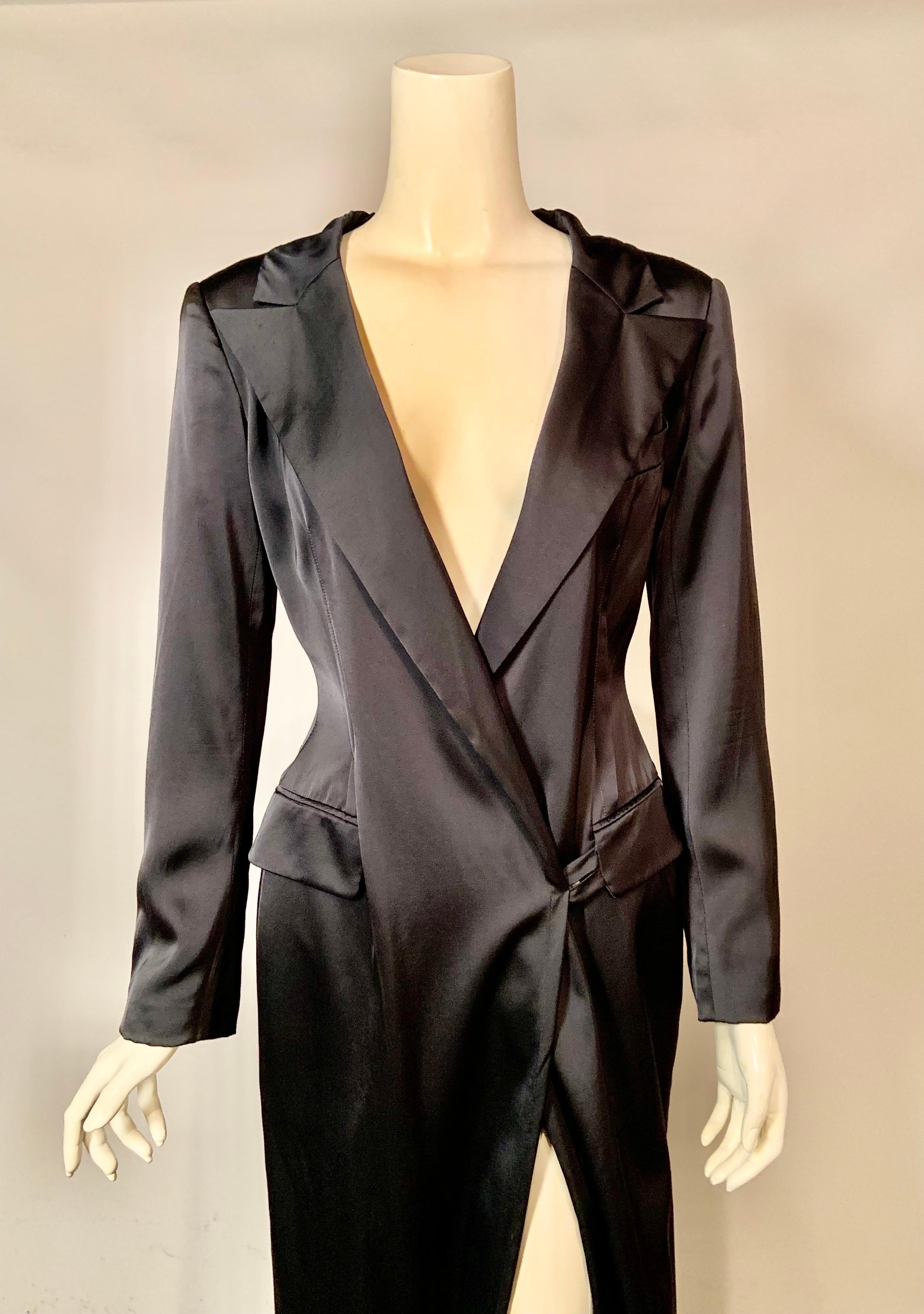 I just love this dress from Lanvin, Paris 2006 and I really can't believe that the former owner never wore the dress.  The original tag from Barney's New York is still attached.  The dress is midnight blue silk with a notched collar, breast pocket,