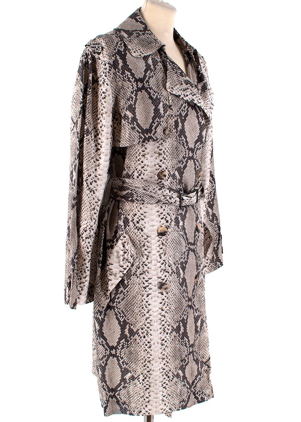 Lanvin Beige Snake Print Lightweight Silk Trench Coat

-Made of lightweight soft silk 
-Gorgeous snake print 
-Classic double breasted cut 
-Pockets to the front 
-Slit to the back 
-Belt to the waist 
-Timeless elegant style 

Materials:
100% silk