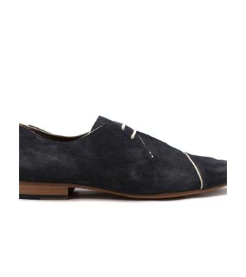 Lanvin Navy Suede White Trim Oxford Brogues

- Navy suede Oxford brogues with white piped detail with leather sole and low stacked heel

Materials 
100% Suede 

Made in Portugal 

PLEASE NOTE, THESE ITEMS ARE PRE-OWNED AND MAY SHOW SIGNS OF BEING