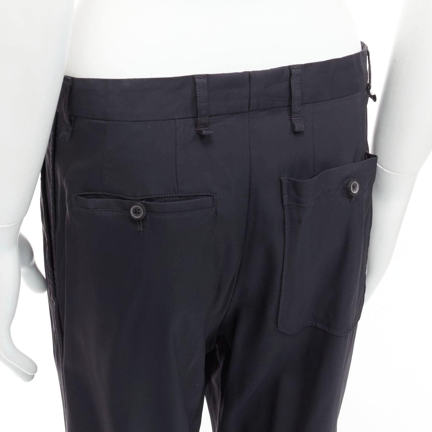 LANVIN navy viscose blend front pleats classy tapered dress pants IT46 S
Reference: CNLE/A00284
Brand: Lanvin
Designer: Alber Elbaz
Material: Viscose, Blend
Color: Navy
Pattern: Solid
Closure: Zip Fly
Made in: Italy

CONDITION:
Condition: Good, this