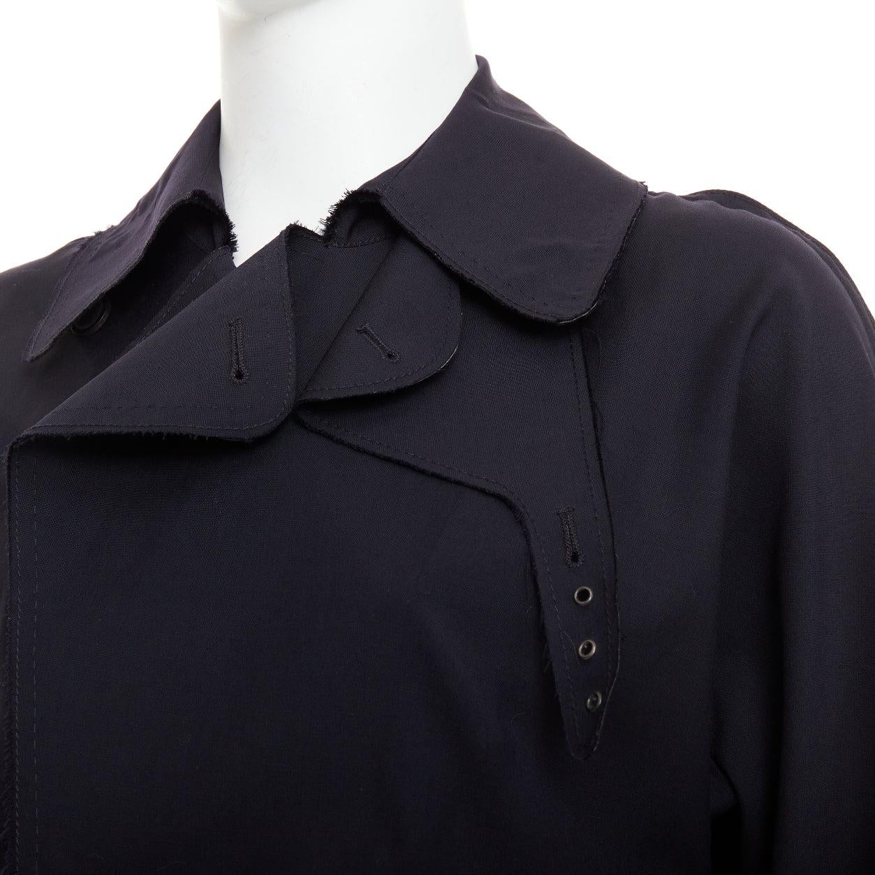 LANVIN trench in lana navy ispirato al bomber interfacciato FR48 M.
Riferimento: PRWU/A00180
Marchio: Lanvin
Designer: Alber Elbaz
Materiale: Lana
Colore: Marina Militare
Modello: Tinta unita
Chiusura: bottoni a pressione
Fodera: Tessuto
