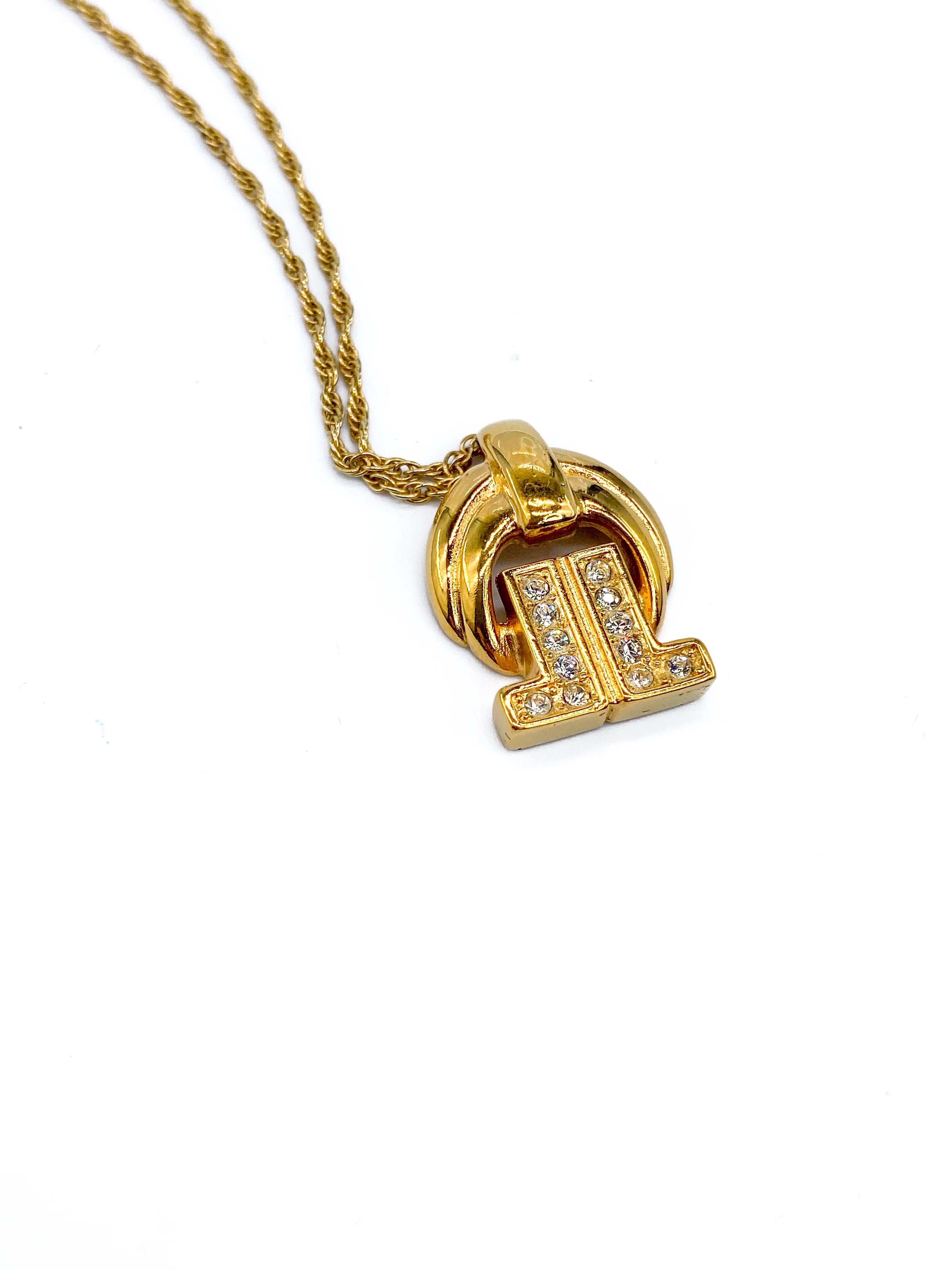 Lanvin 1970s Vintage Necklace. 

Beautifully delicate pendant from the Lanvin 70s archive, featuring the classic 1970s double L logo

Detail
-Crafted from a high quality gold plated base metal
-Delicate rope style chain
-Double L logo set with tiny