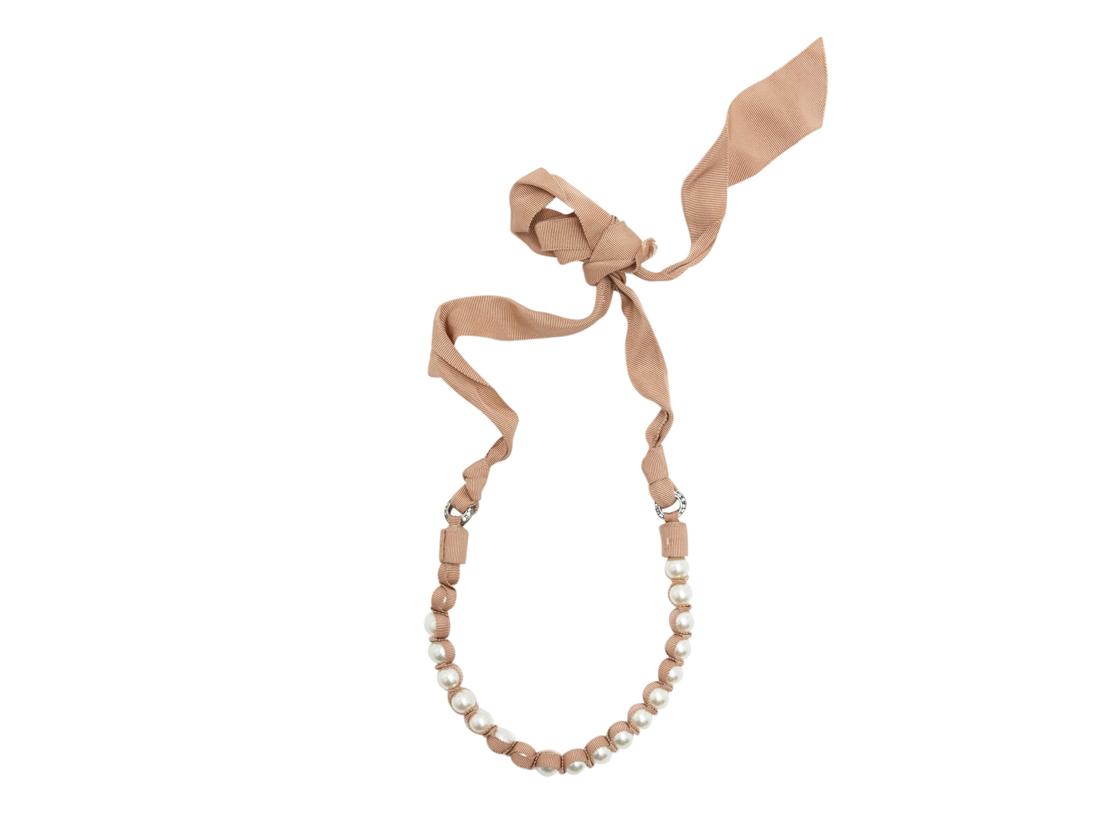 Product details:  Nude grosgrain and faux pearl necklace by Lanvin.  Self-tie closure.  56