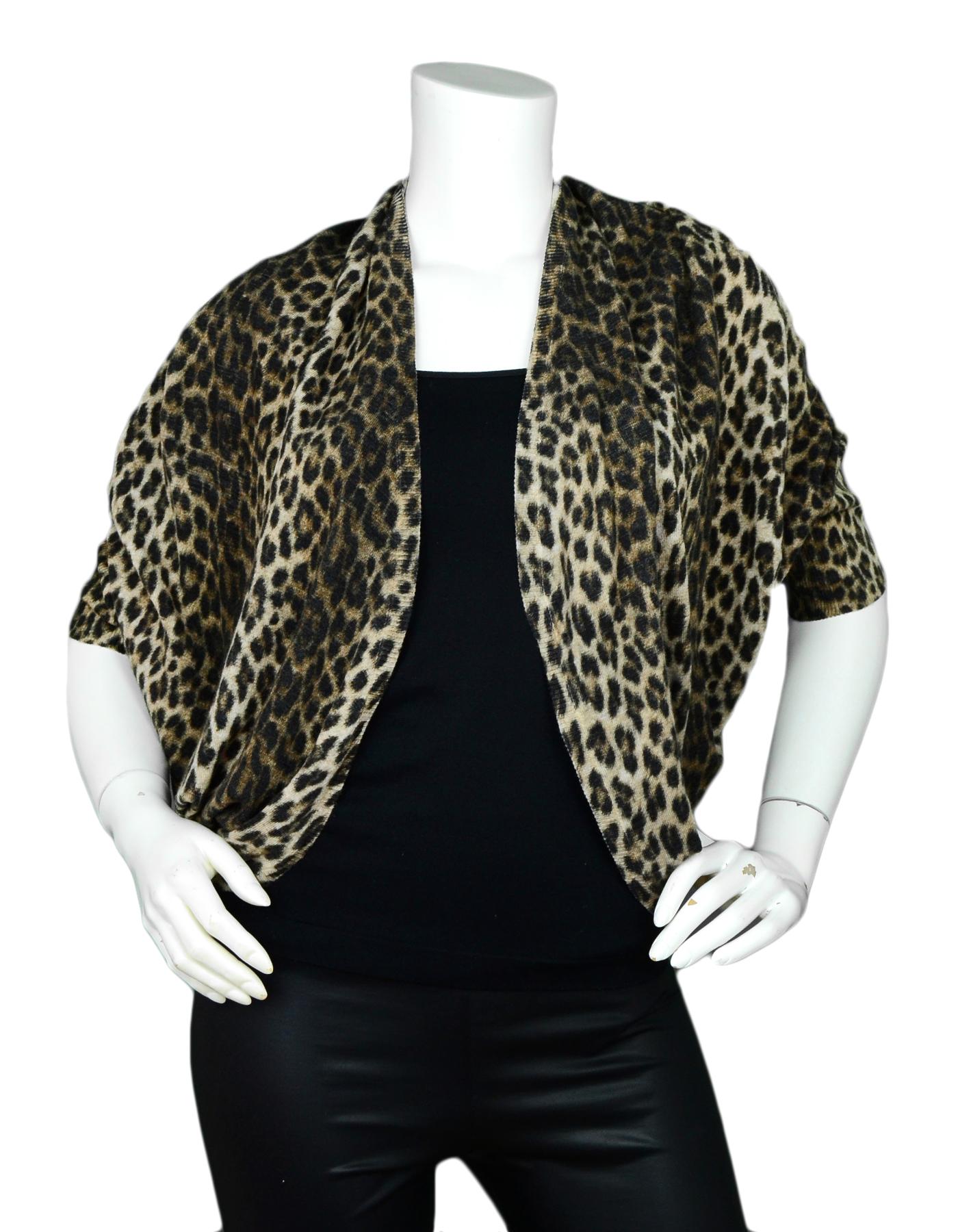 Lanvin NWT Leopard Print Cocoon Sweater sz Medium rt $1,985

Made In: Italy
Color: Brown, leopard print 
Materials: 100% wool
Opening/Closure: Open front
Overall Condition: New with tags
Estimated Retail: $1,985 + tax
Includes: Tags
Tag Size: