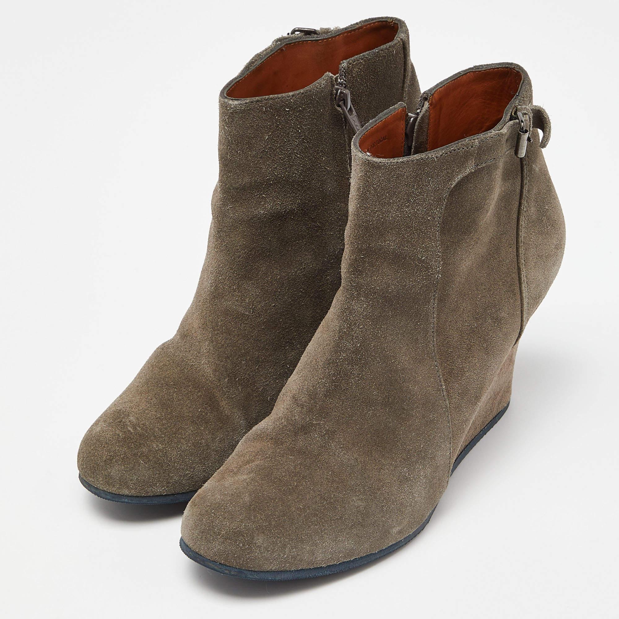 Enjoy the most fashionable days with these stylish Lanvin wedge ankle boots. Modern in design and craftsmanship they are fashioned to keep you comfortable and chic