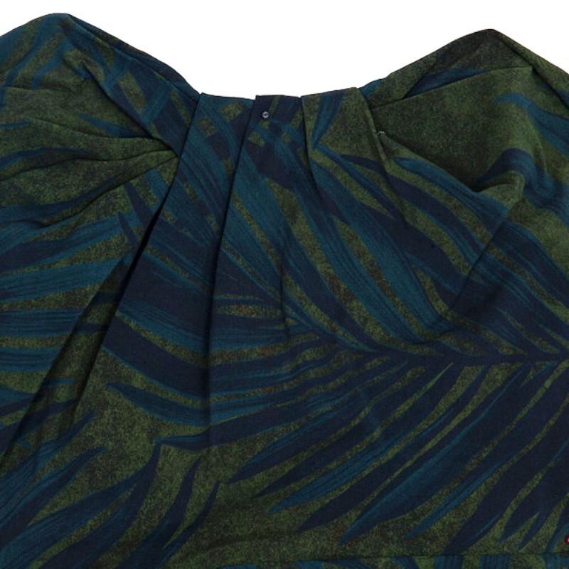 This exquisite dress is printed in a deep green and blue tropical leaf print. It has gathered detailing on the chest and ruched detailing to one side. It comes with an exposed side zipper closure.

Includes: The Luxury Closet Packaging

