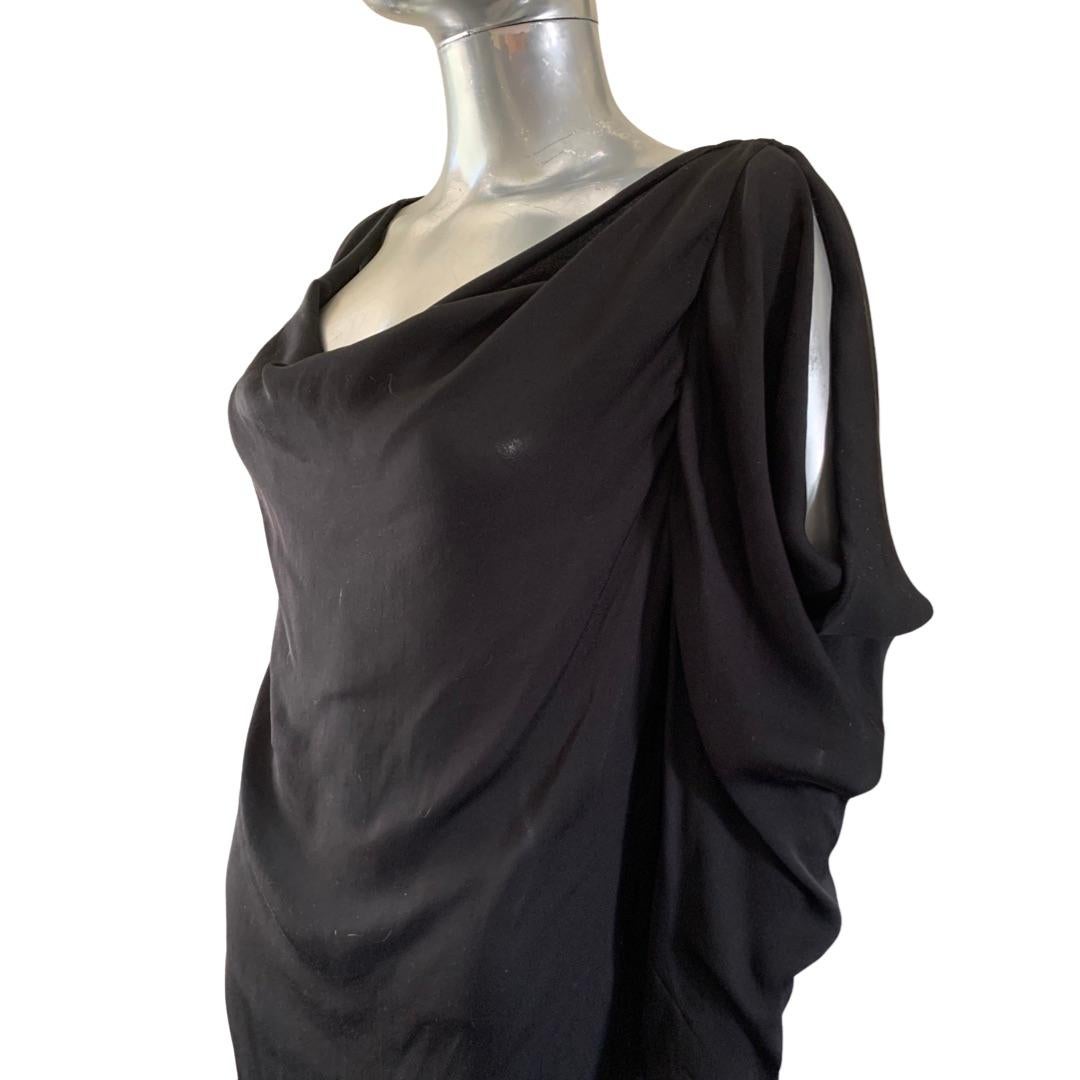 Sometimes the most simple of blouse can be the most chic. Especially when you know how to drape like the House of Lanvin does. The black silk is lightweight and drapes so beautiful. The cowl front drapes beautifully and skim the breasts. The sleeves