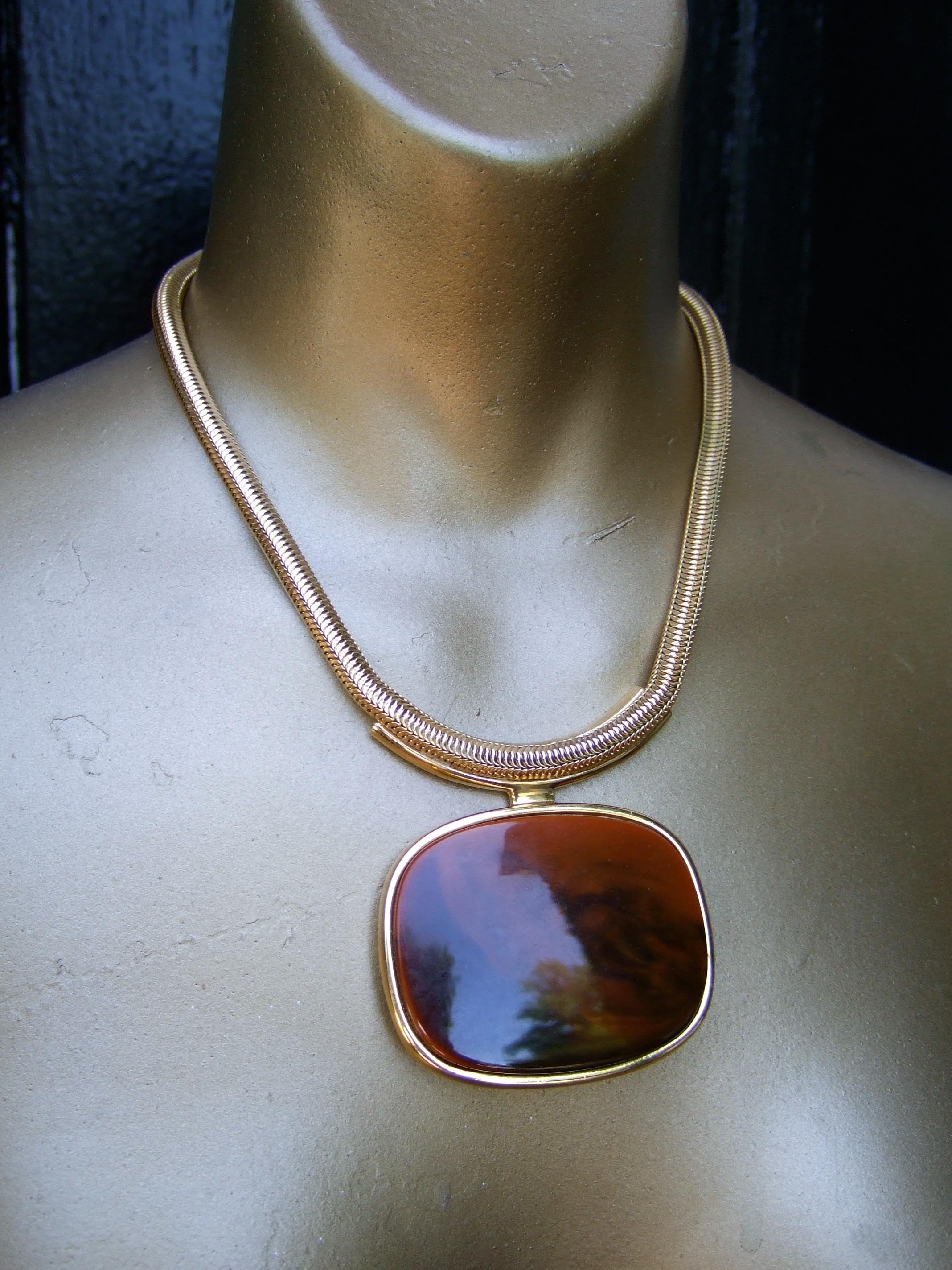 LANVIN Paris Mod 1970s interchangeable resin pendant choker style necklace 
The sleek Lanvin choker style necklace is designed with two interchangeable 
 bold resin pendants. One is a jade green resin color pendant; the other resin pendant 
is a