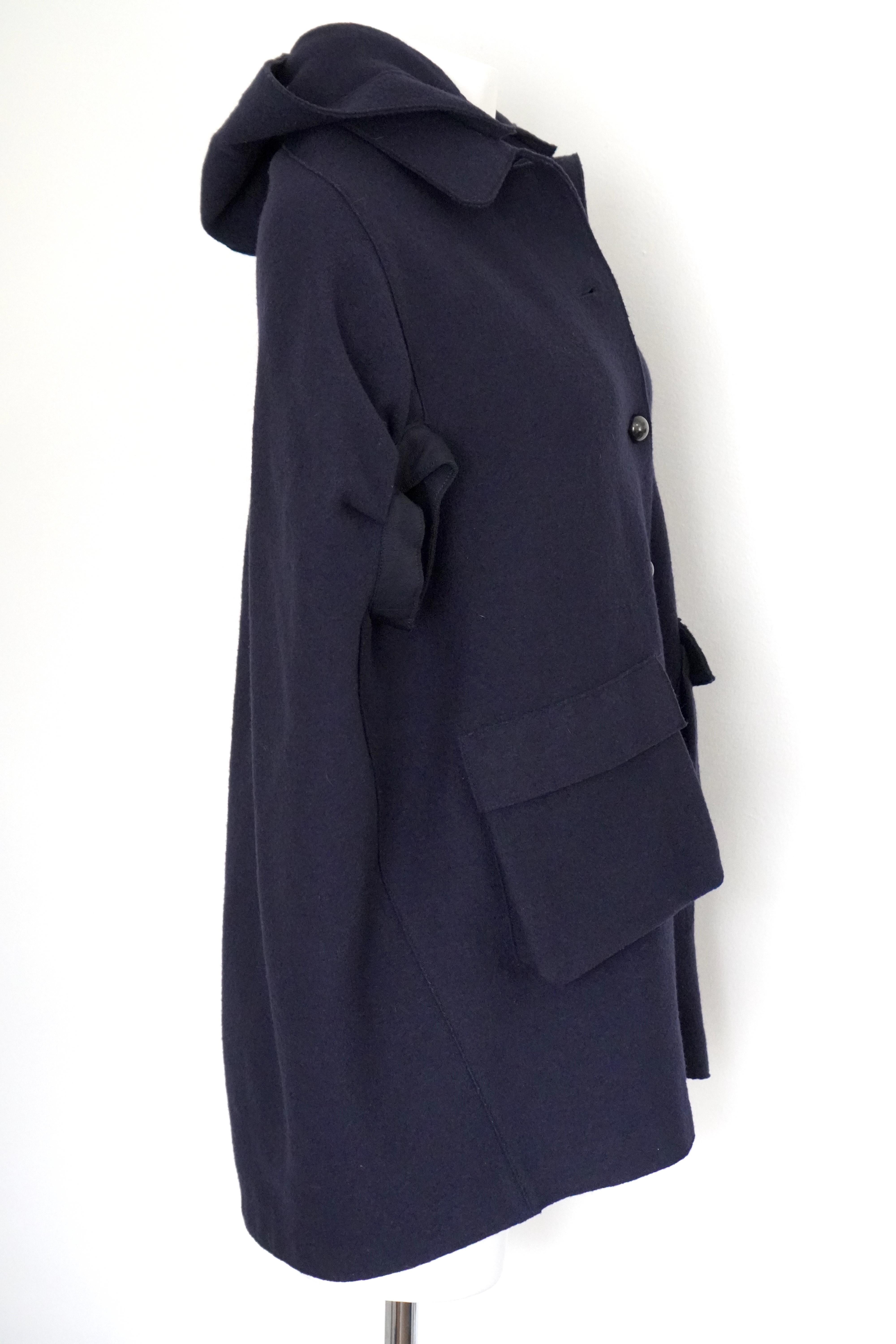 Lanvin Navy Hooded Cape Coat 
Made in: Italy
Fabric Material: 70% Wool, 20% Polyamide, 10% Cashmere
Removable hood
5 button closure 
No size tag