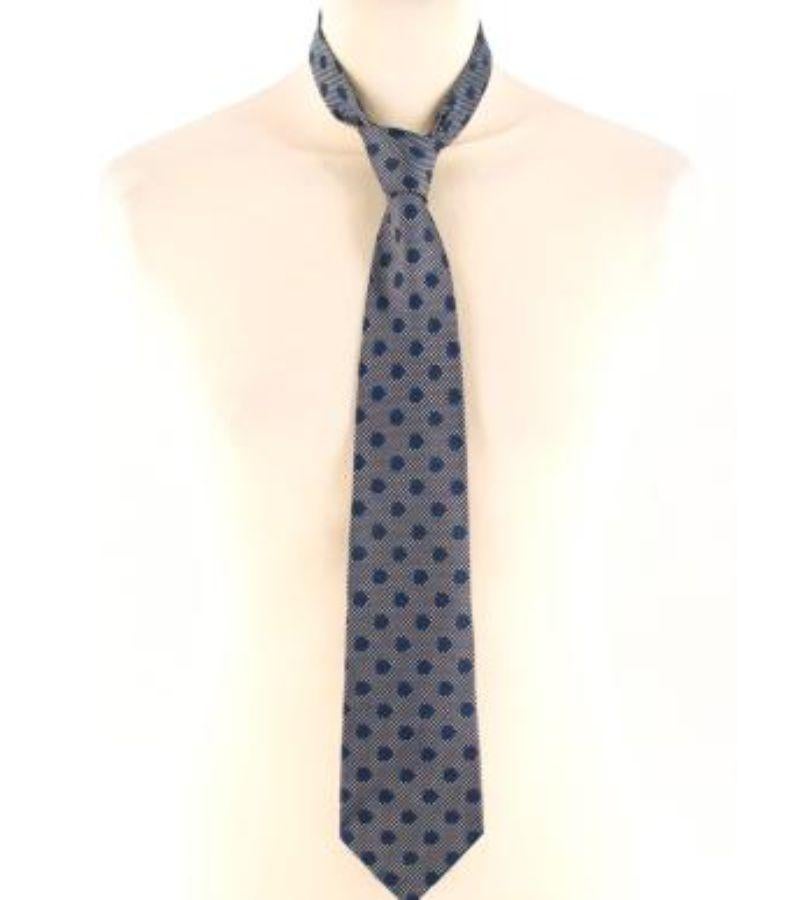 Lanvin Paris Dark Navy Spotted Silk Tie 

- Dark Navy Tie 
- Gold spotted pattern throughout 
- 100% Silk 
- Made in France 

Please note, these items are pre-owned and may show some signs of storage, even when unworn and unused. This is reflected