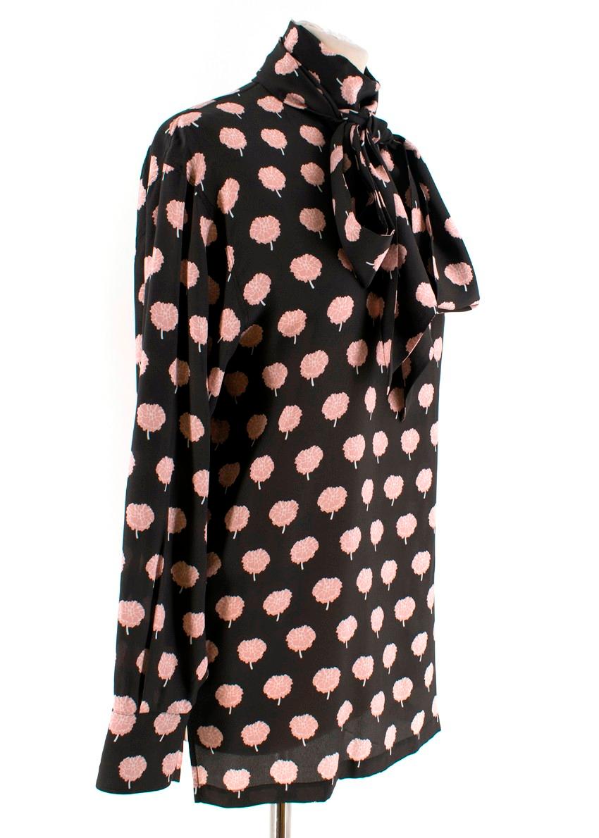Lanvin Peony-Print Silk Shirt.

- Black shirt with pink & white peony floral print
- Long-sleeved, buttoned cuffs
-  Fold over neck, Self fastening back neck tie
- Centre back key hole with button fastening
- Lightweight 

Please note, these items