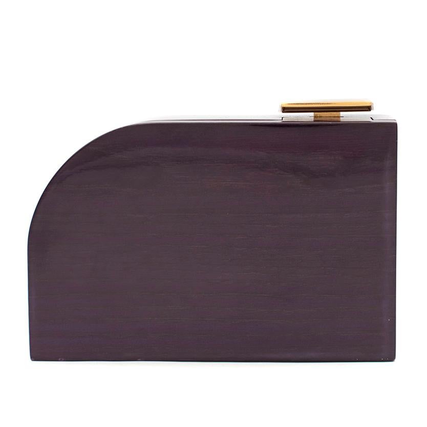 Lanvin Piano Aubergine Wood Box Clutch 

- Runway edition
- Aubergine Purple Box Clutch 
- Painted wooden frame, piano-like style 
- Gold toned push clasp fastening closure, hinged base
- Suede goat lining with Lanvin logo embossed
- Strapless