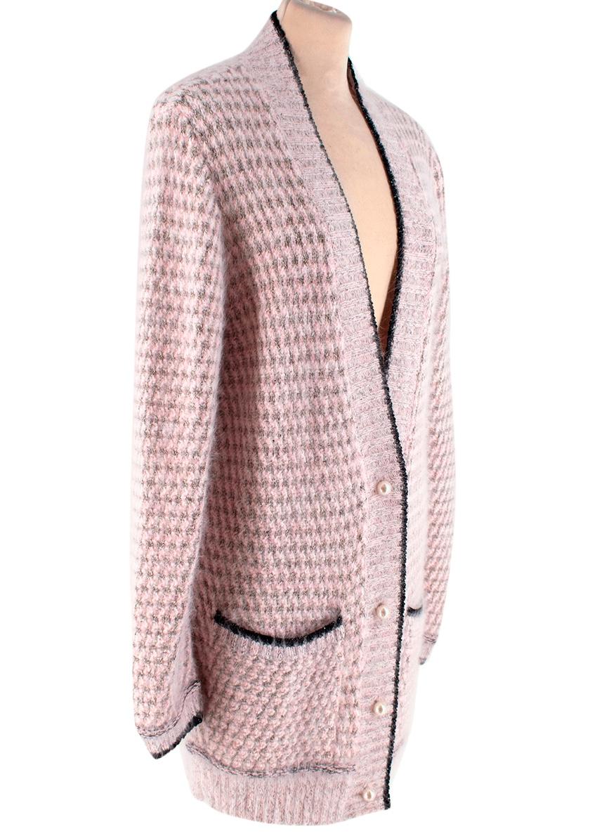 Lanvin Pink Angora Blend Knit Longline Cardigan

-Extremely soft angora texture 
-Gorgeous pink and and metal fibers knit pattern 
-Faux pearl button fastening to the front 
-Contrasting Black details to the pockets cuffs and neckline 
-V shaped