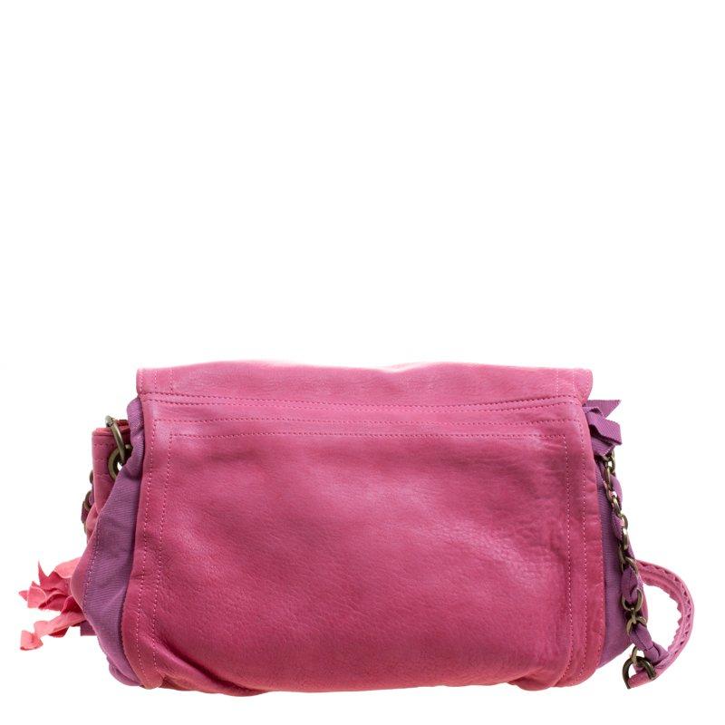 Handbags are more than just style statements. That's why one should opt for pieces that are functional and stylish at the same time, just like this shoulder bag from Lanvin. Created from leather and fabric, the bag has a lovely pink hue and it comes