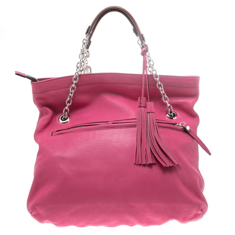 This Lanvin creation will add a pop of color to your outfit. Crafted from leather it features dual handles along with tassels, a zip pocket at the rear and a front pocket secured by a turn-lock closure. The zip top closure opens to a fabric lined