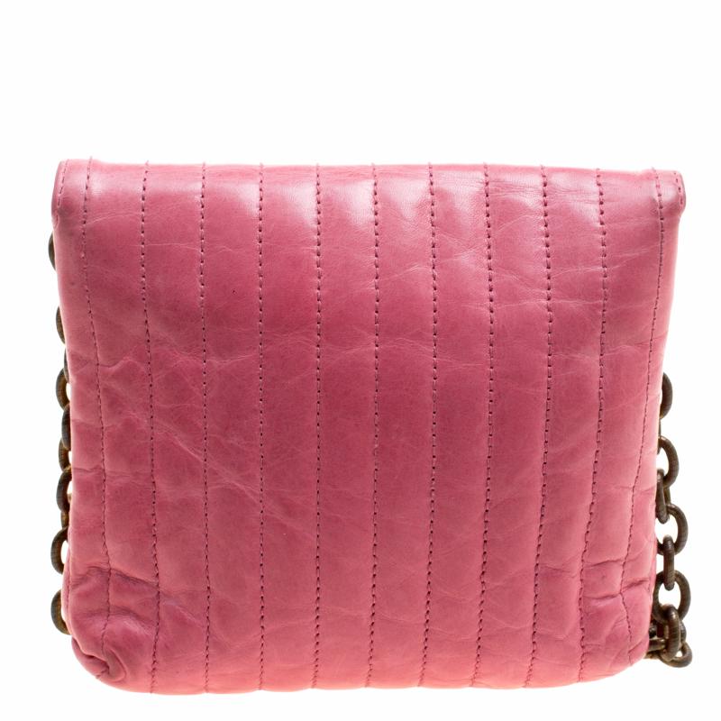 Perfect to wear through day parties and events and stylish enough to add a pop of colour to your evening looks, this Lanvin Mini Happy crossbody bag is a must have in your accessory collection. Crafted in pink quilted leather, this bag features