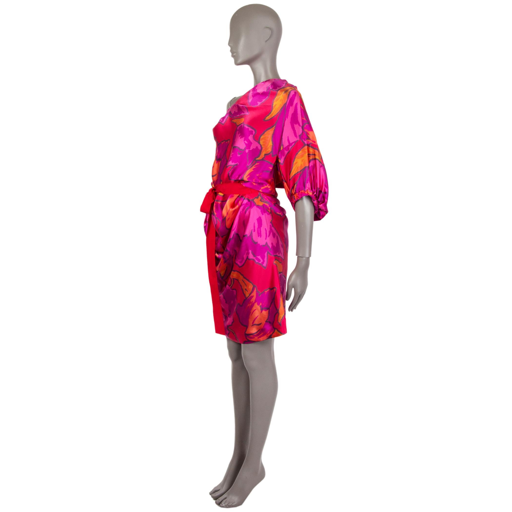 100% authentic Lanvin 3/4-sleeve floral dress in red, fuchsia and black silk (100%) with an asymmetrical neck. Closes on the back and on the side with zipper. Comes with a ribbon belt. Has been worn and is in excellent condition. 

Measurements
Tag