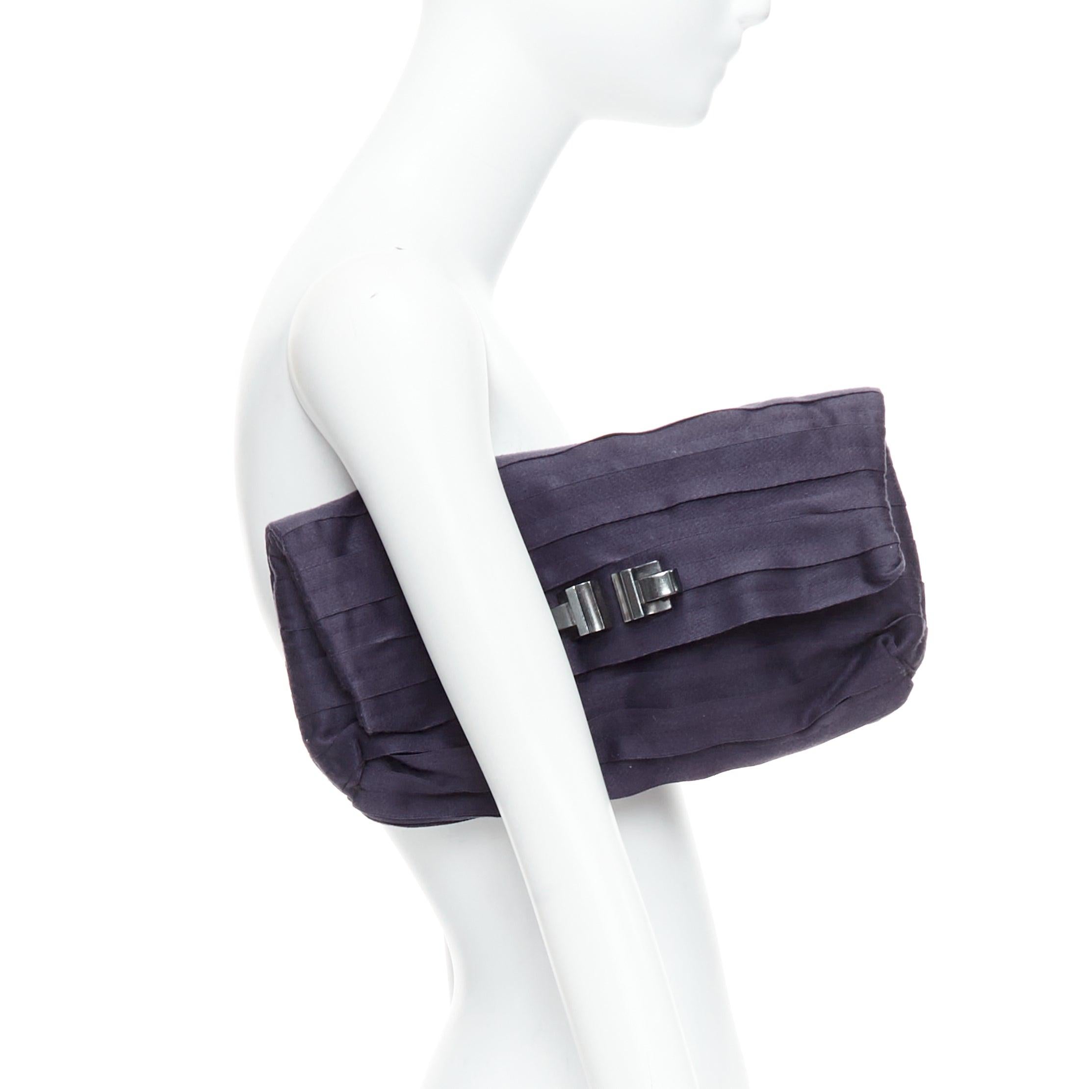 LANVIN purple satin pleated fabric silver buckle foldover clutch bag
Reference: ALCU/A00034
Brand: Lanvin
Designer: Alber Elbaz
Material: Fabric
Color: Purple, Silver
Pattern: Solid
Closure: Magnet
Lining: Black Fabric
Extra Details: Lanvin Navy