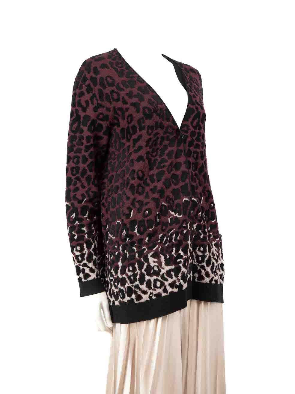 CONDITION is Very good. Hardly any visible wear to cardigan is evident on this used Lanvin designer resale item.
 
 
 
 Details
 
 
 Purple
 
 Wool
 
 Knit cardigan
 
 Leopard print
 
 Long sleeves
 
 Snap button fastening
 
 V-neck
 
 2x Front
