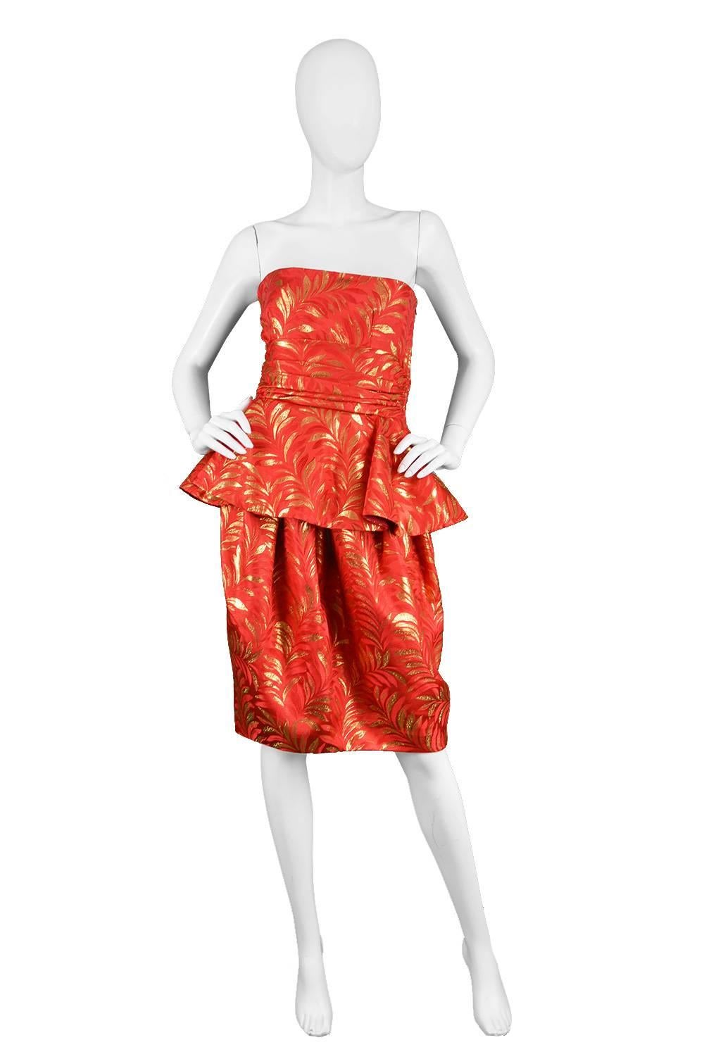 Lanvin Red & Gold Silk Brocade Peplum Vintage Cocktail Evening Dress, 1980s

Estimated Size: UK 6/ US 2/ EU 34. Please check measurements. 
Bust - 32” / 81cm
Waist - 25” / 63cm
Hips - Free
Length (Bust to Hem) - 32” / 81cm

Condition: Excellent