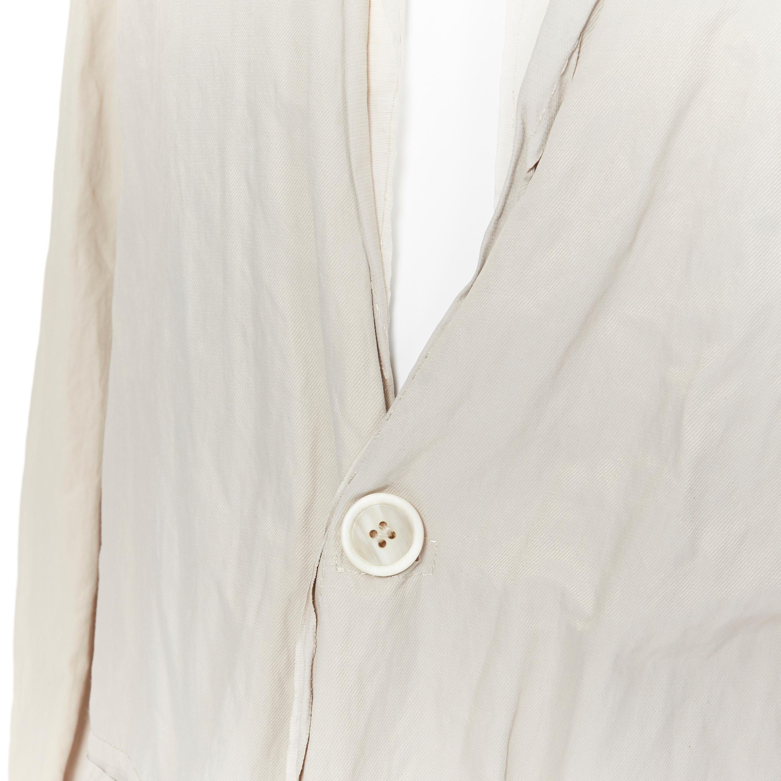 LANVIN Runway light stone coated cotton raw seam summer blazer jacket EU50 L
Brand: Lanvin
Designer: Alber Elbaz
Model Name / Style: Blazer
Material: Cotton  blend
Color: Beige
Pattern: Solid
Closure: Button
Extra Detail: Long sleeve. Collared