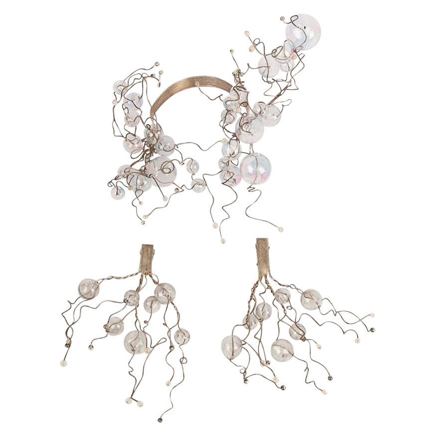 Set di collana e orecchini Lanvin in metallo argentato e sfere trasparenti in vendita