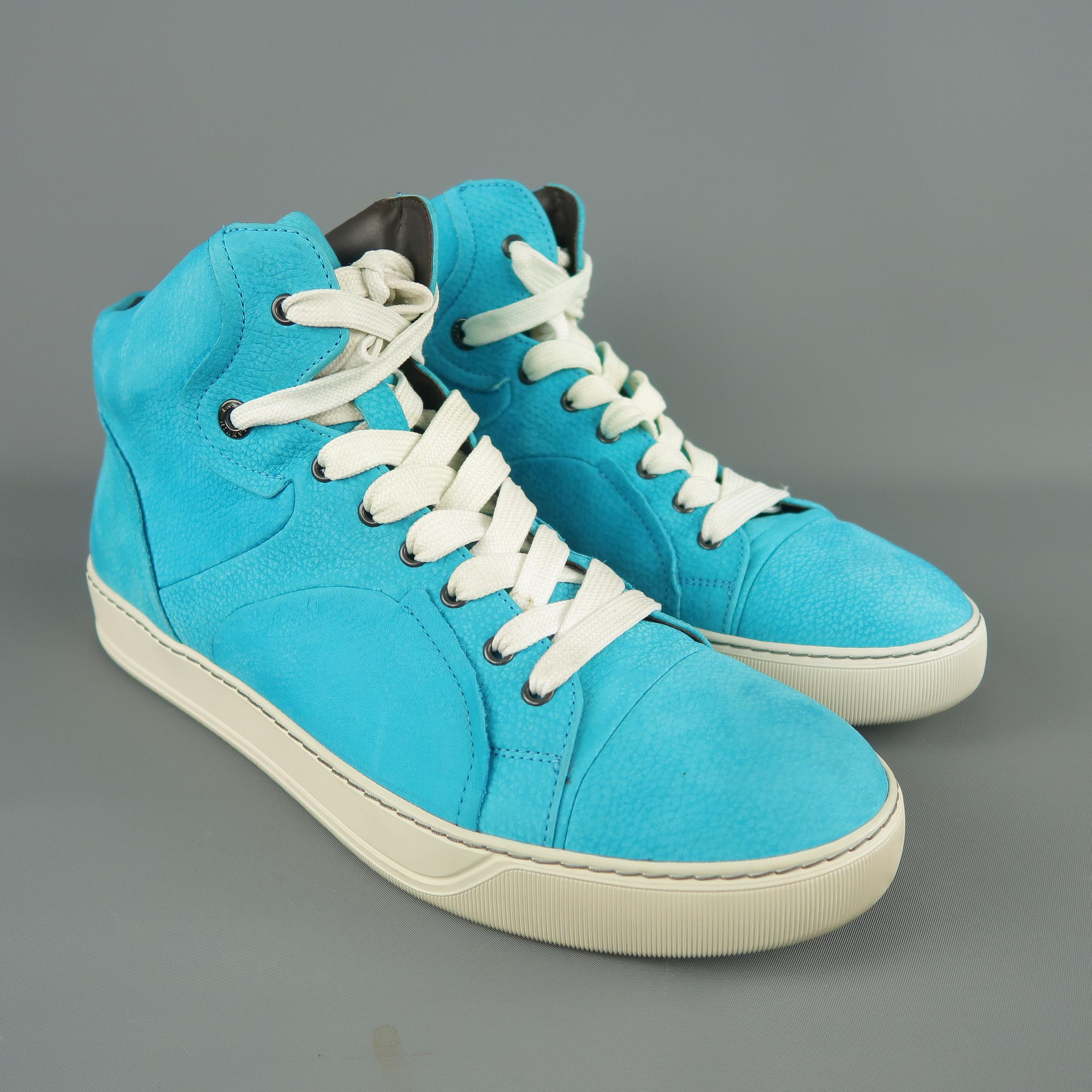 LANVIN high top sneakers come in aqua blue sueded nubuck leather with a white rubber sole and brown leather interior. Made in Italy.
 
Good Pre-Owned Condition.
Marked: UK 9
 
Measurements:
 
Length: 12 in.
Width: 4 in.
Height: 5 in.
