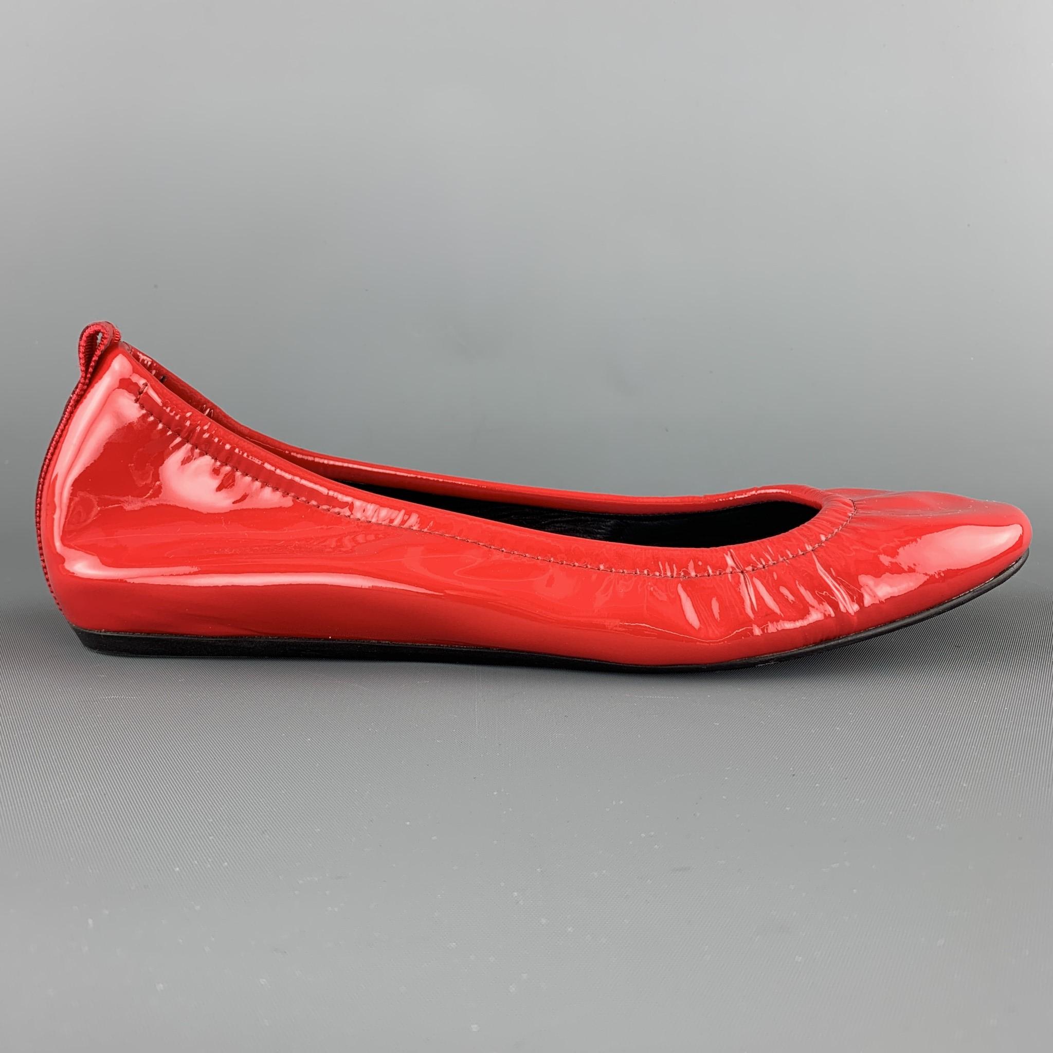 LANVIN classic ballet flats come in bright red patent leather with a round toe and ribbon detailed back. With box. 

Very Good Pre-Owned Condition.
Marked: IT 40

Outsole: 10.25 x 3.5 in.