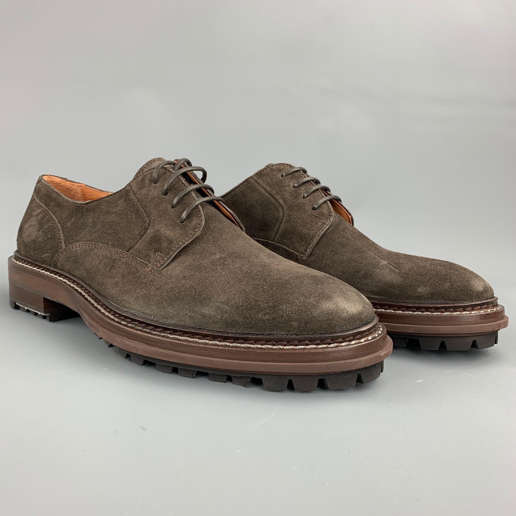 LANVIN shoes comes in a brown suede with a silver tone metal detail featuring a cap toe, lug sole, and a lace up closure. Minor wear. Made in Portugal.

Very Good Pre-Owned Condition.
Marked: 10

Outsole:

12.5 in. x 4 in. 

