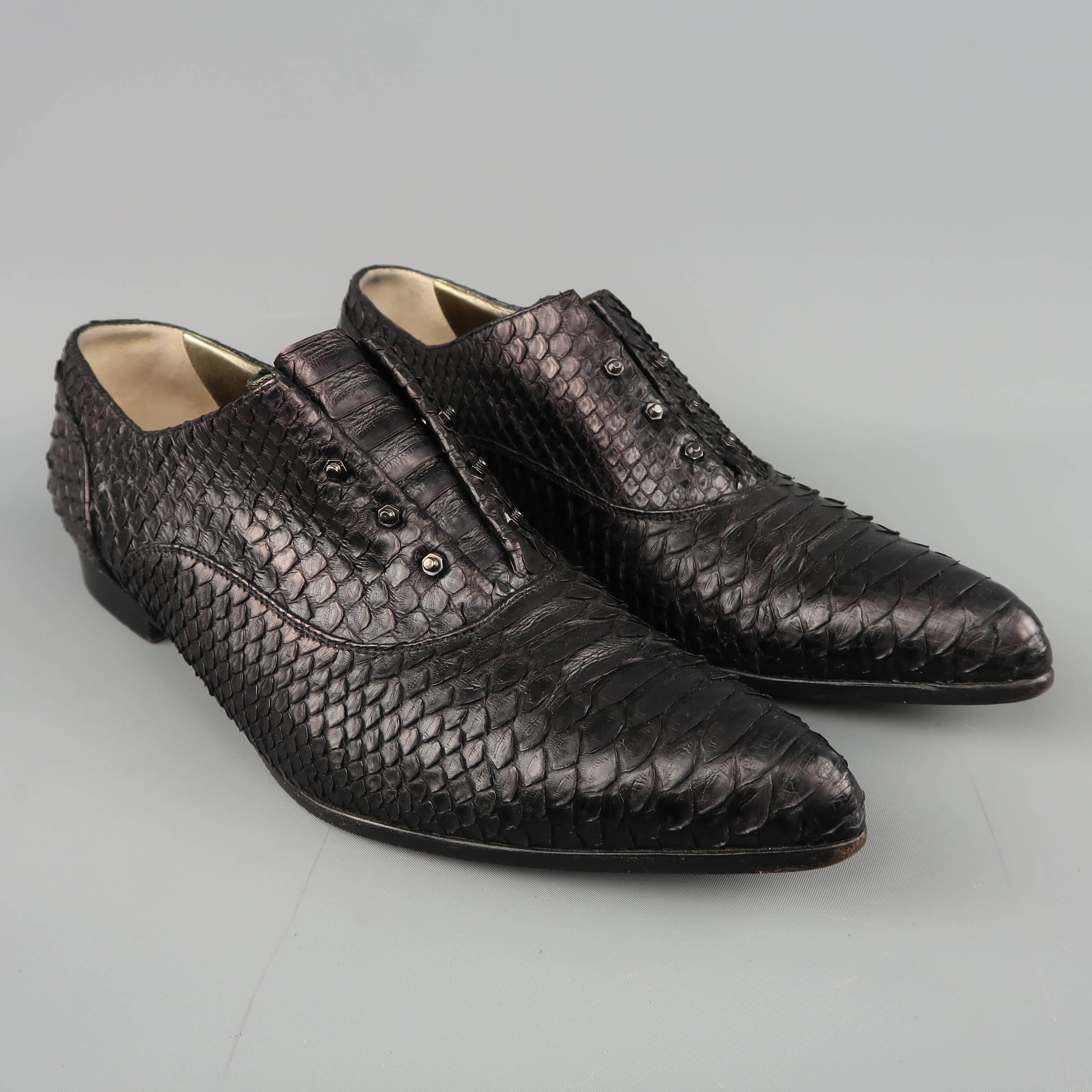 LANVIN oxfords come in black snakeskin leather with a pointed toe, gold liner, and slip on elastic closure with screw details. Made in Italy.
 
Good Pre-Owned Condition.
Marked: IT 42
 
Measurements:
 
Outsole: 11.75 x 4.75 in.