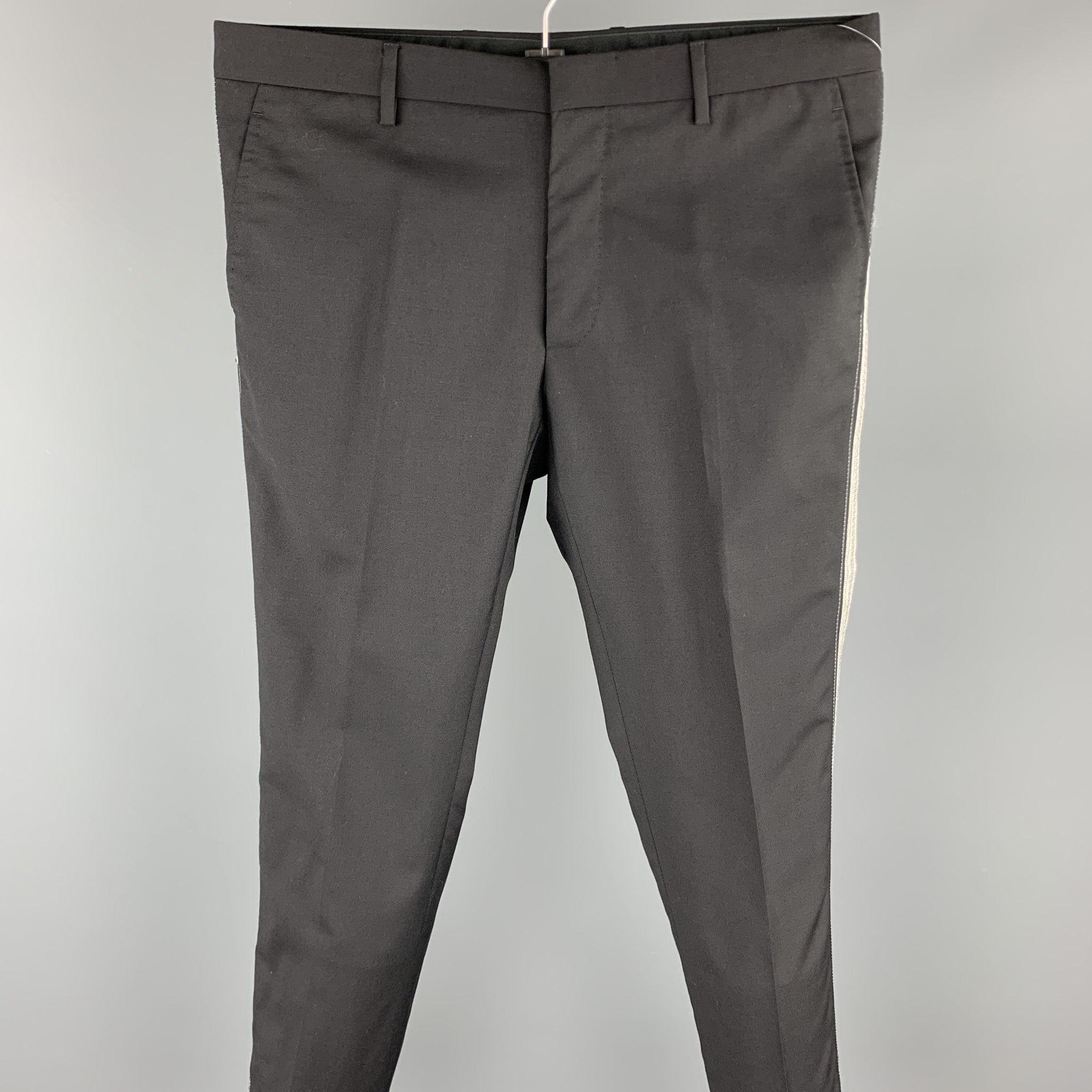 LANVIN dress pants comes in black wool featuring a flat front, fabric tuxedo stripe, zip fly closure. Made in Italy.Excellent
 Pre-Owned Condition. 
 

 Marked:  IT 48 
 

 Measurements: 
  Waist: 34 inches Rise: 8 inches 
 Inseam: 30 inches 
  
  
