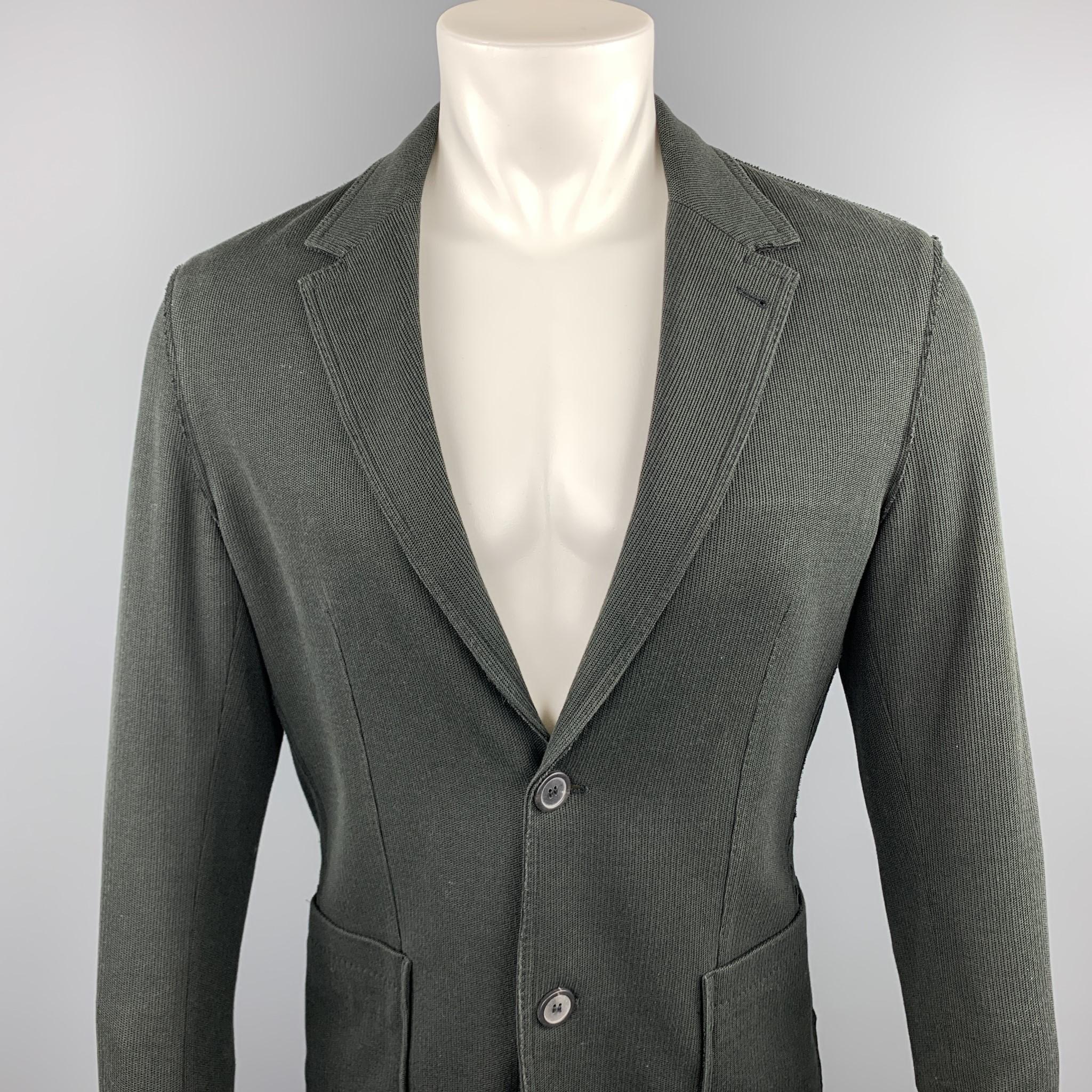 LANVIN sport coat comes in a charcoal woven cotton featuring a notch lapel, patch pockets, and a two button closure. Made in Romania. 

Very Good Pre-Owned Condition.
Marked: 48

Measurements:

Shoulder: 16.5 in. 
Chest: 38 in. 
Sleeve: 26 in.