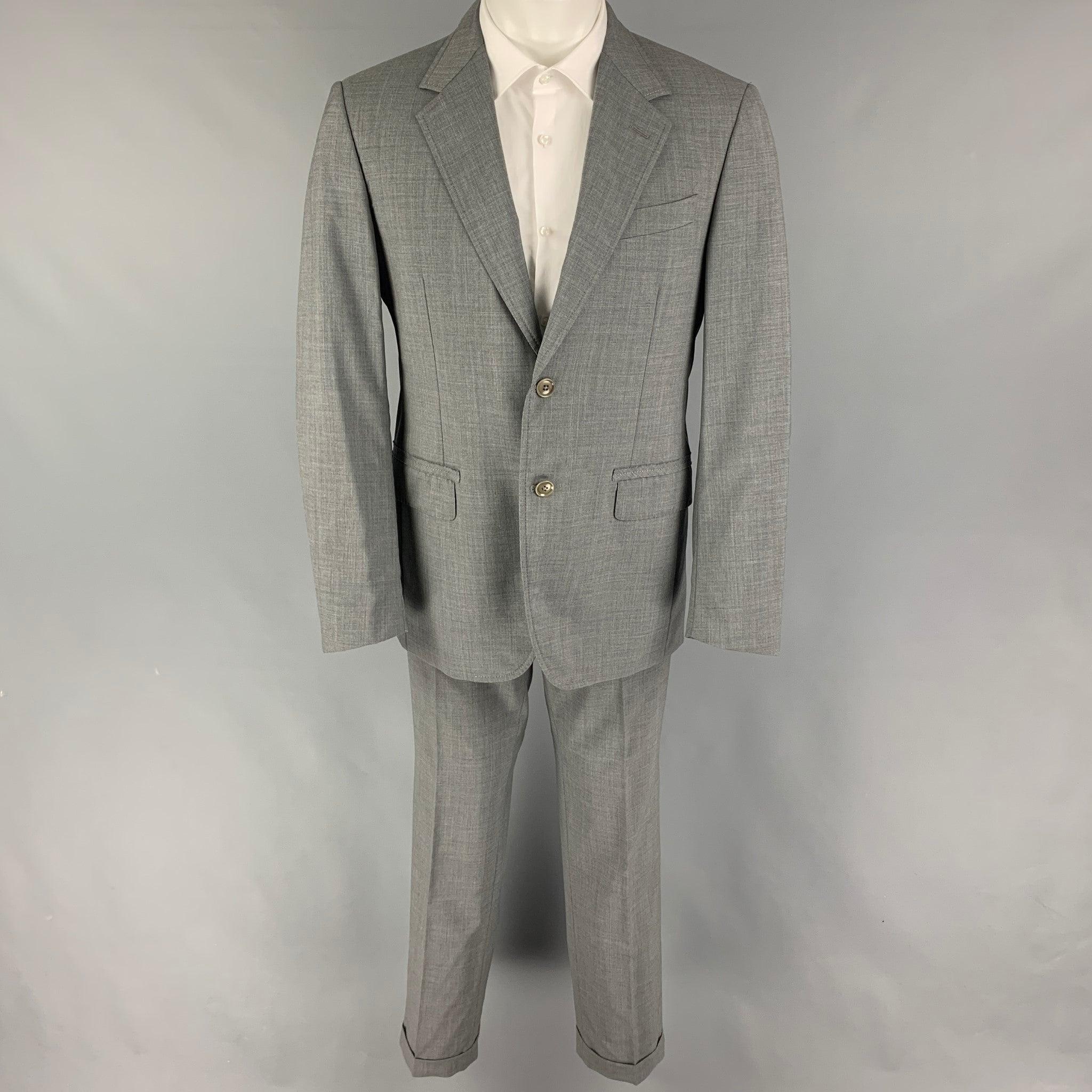 LANVIN
 suit comes in a gray wool with a full liner and includes a single breasted, double button sport coat with a notch lapel and matching flat front trousers. Made in Italy.Very Good Pre-Owned Condition. 
 

 Marked:  50 
 

 Measurements: 
 