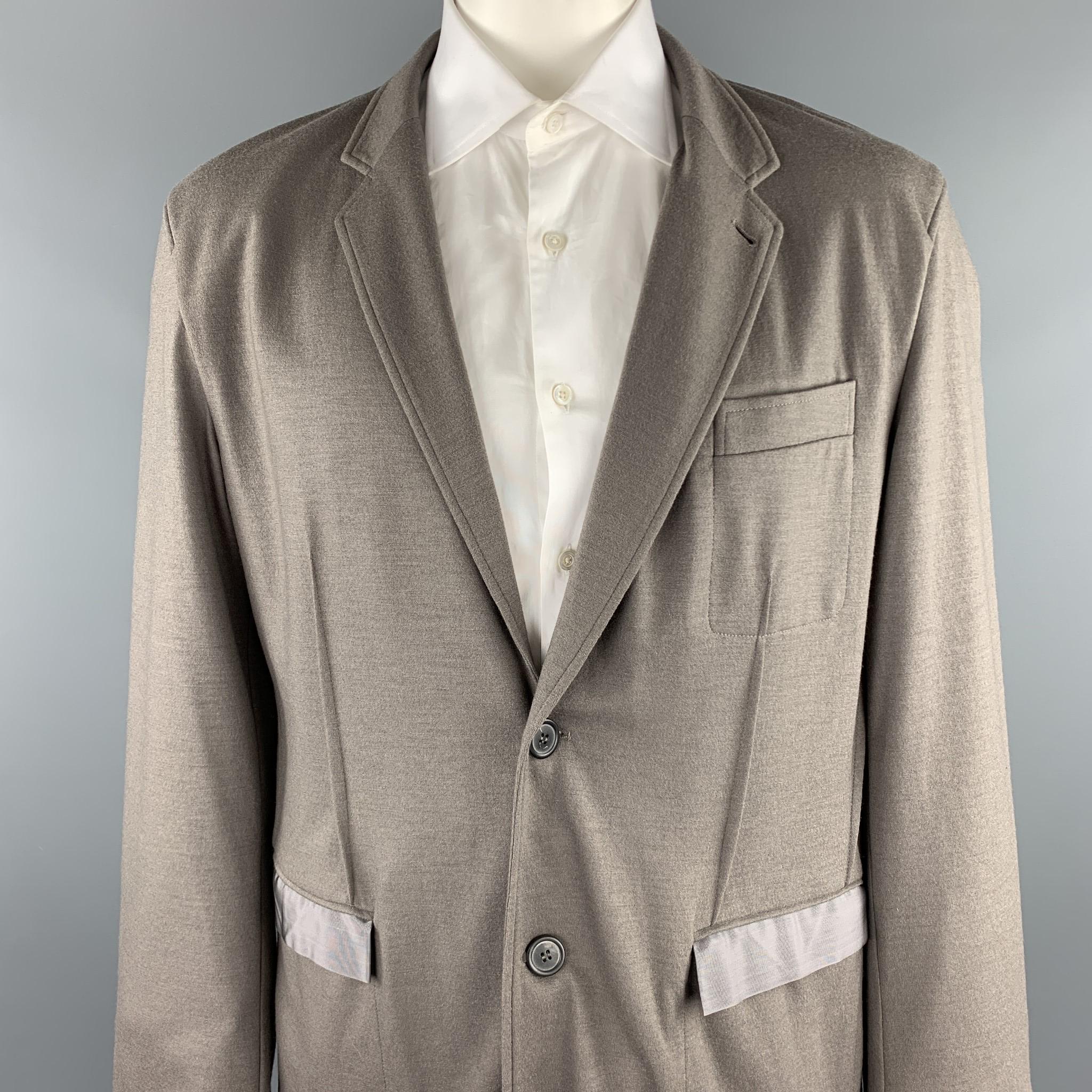 LANVIN sport coat comes in a taupe wool / cashmere with no liner featuring a notch lapel, flap pockets, and a two button closure. Made in Romania.

Very Good Pre-Owned Condition.
Marked: No size marked

Measurements:

Shoulder: 20 in. 
Chest: 44 in.
