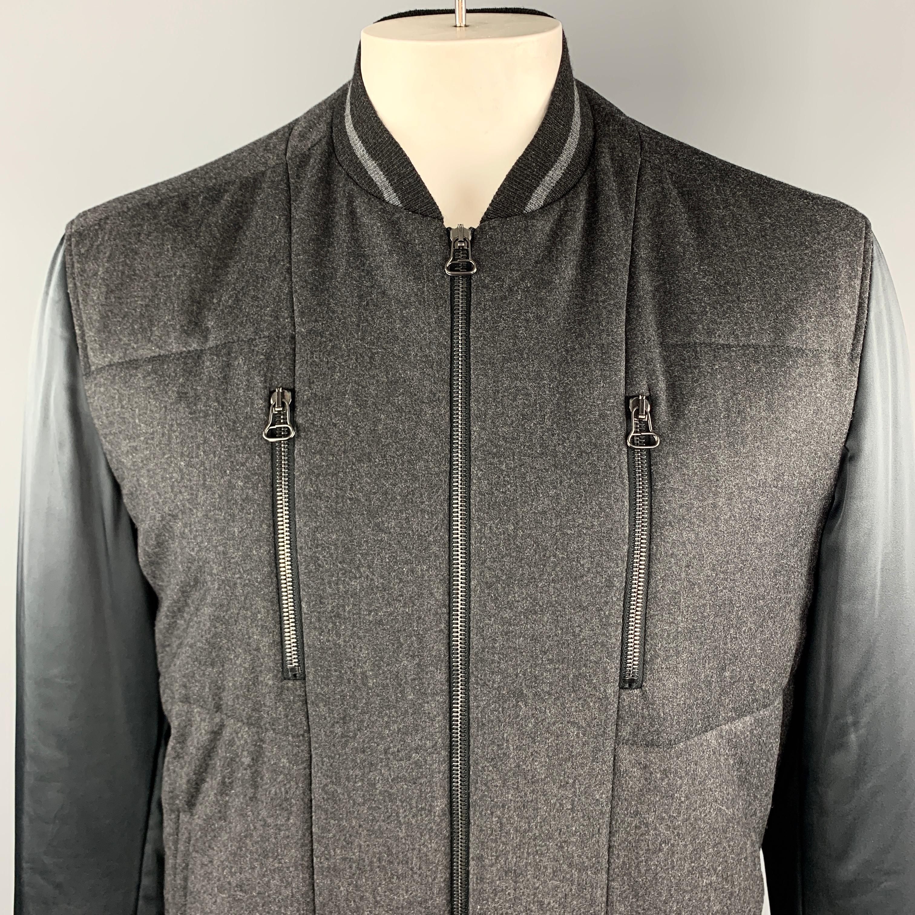 LANVIN Jacket comes in a charcoal wool / cashmere materials, with a contrast trim at collar, cuffs and hem, olive sleeves, a quilted front, zip and snap pockets, zip up. Made in Romania. 

Excellent Pre-Owned Condition.
Marked: EU