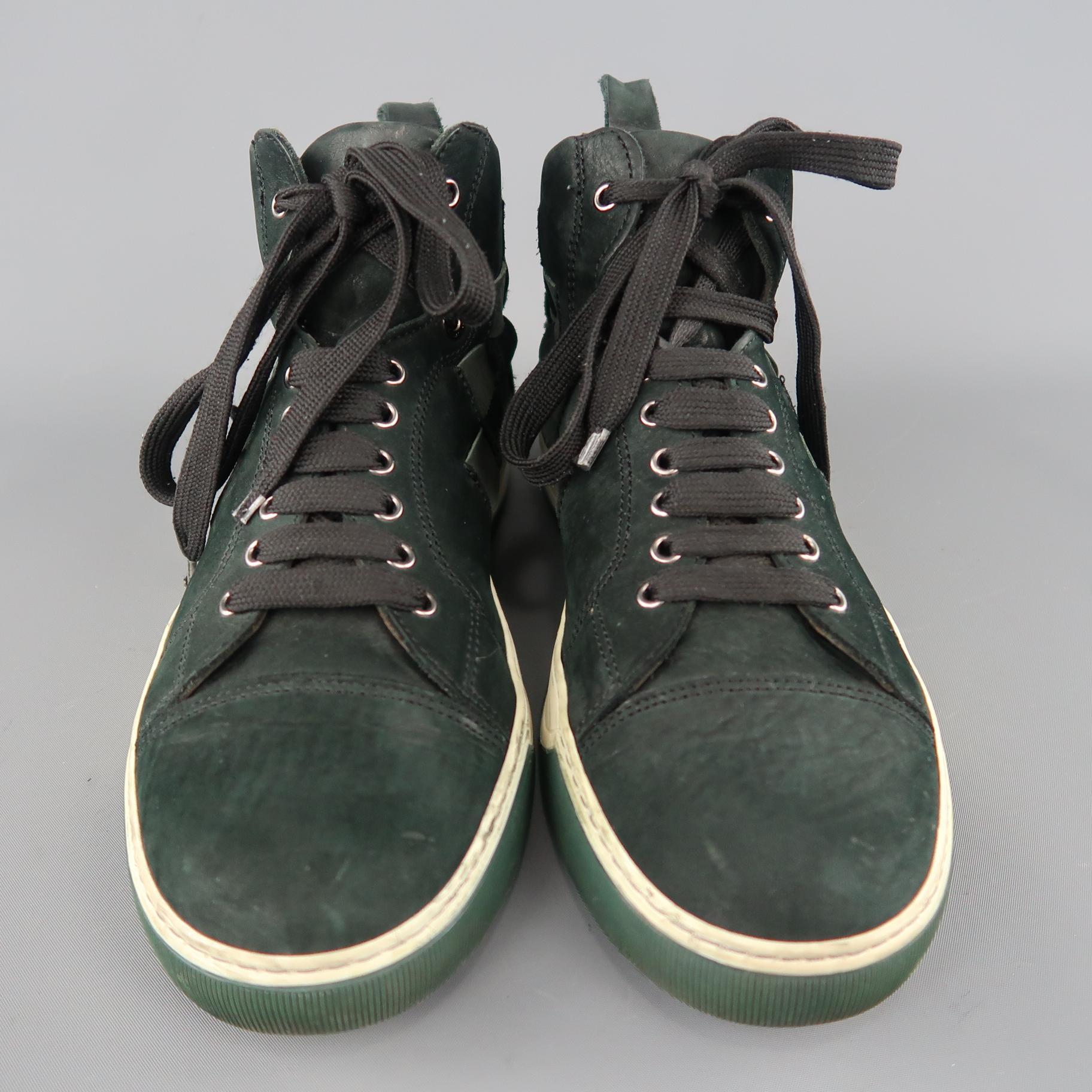 LANVIN high top sneakers come in forest green nubuck leather with a cap toe, dual tone rubber sole, and woven detail. Wear throughout. As-is. With Box. Made in Portugal.
 
Good Pre-Owned Condition.
Marked: UK 8
 
Outsole: 12 x 4.25 in.
