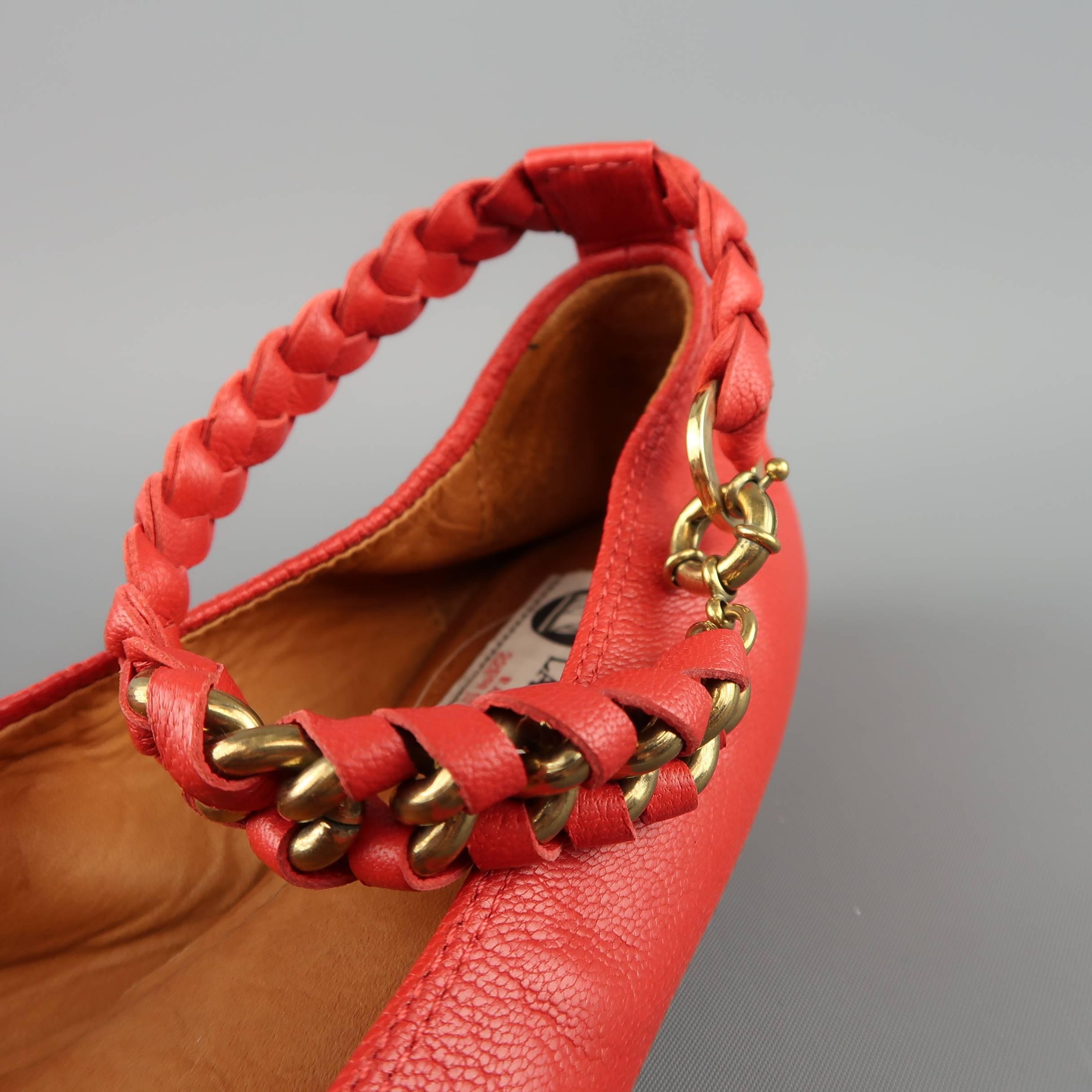LANVIN ballet flats come in red leather with a round toe and braided leather and dark gold tone chain ankle strap. Made in Portugal.
 
Good Pre-Owned Condition.
Marked: IT 39
 
Measurements:
 
Outsole: 10 x 3.25 in.

