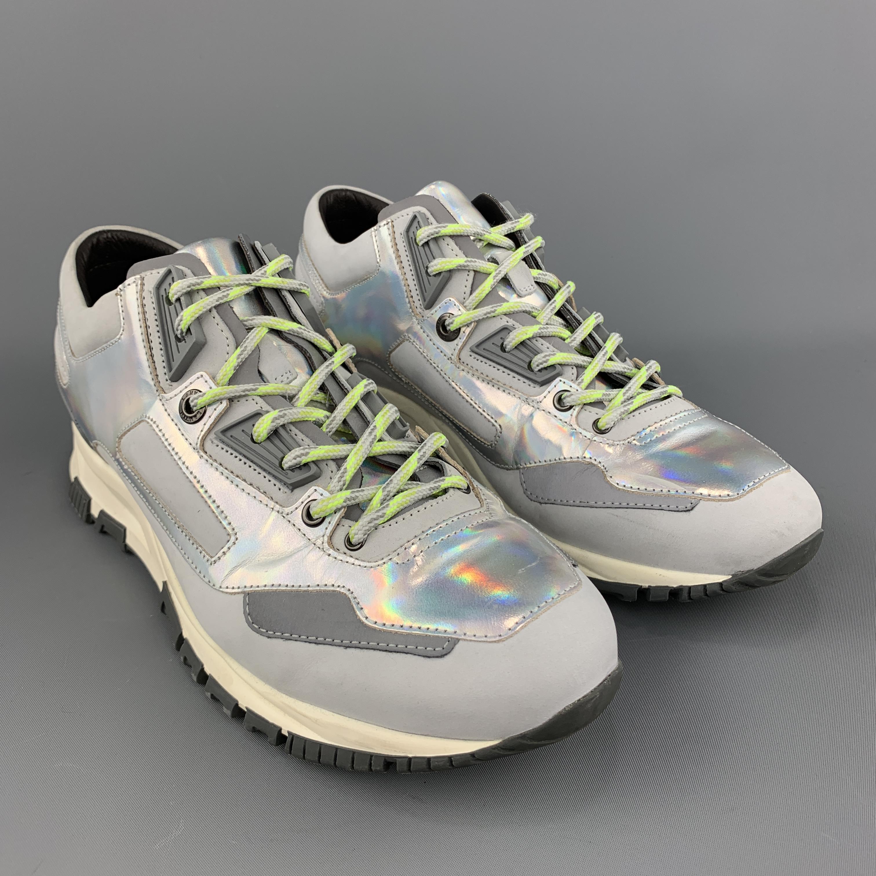 LANVIN sneakers come in silver gray fabric with holographic panels and reflective accents. With box. Made in Portugal.
 
Very Good Pre-Owned Condition.
Marked: UK 8
 
Outsole: 11.75 x 4.25 in.